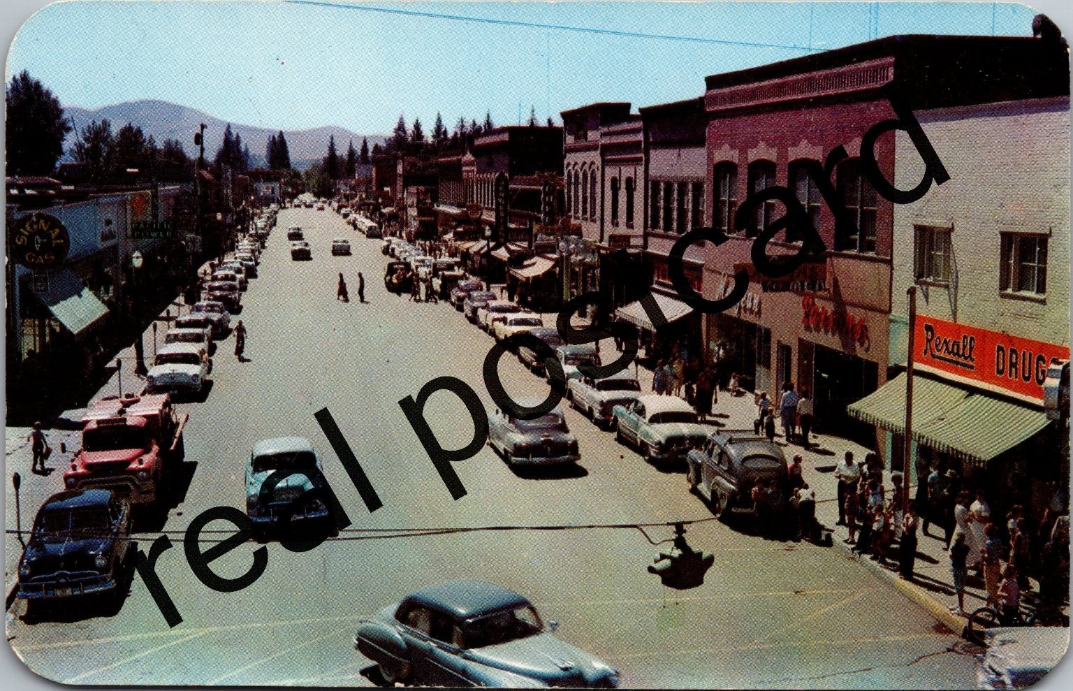 Vintage Sandpoint Idaho Main Street Cars Rexall Drugs Dexter Press Postcard