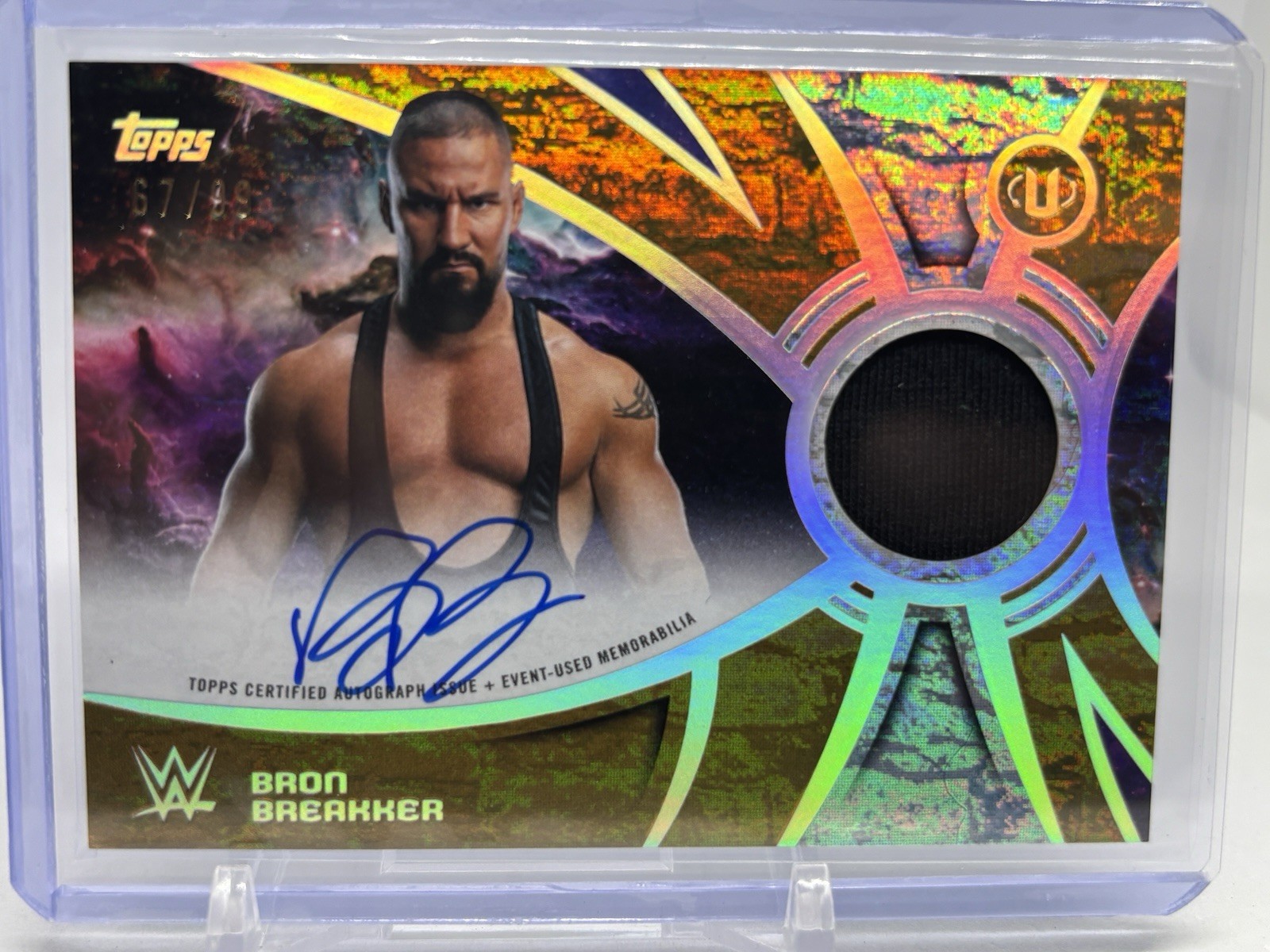 2026 Topps Universe WWE Bron Breakker Superstar Relic Auto /99 (H217) 2026 Topps Universe WWE Bron Breakker Superstar Relic Auto /99 (H217)