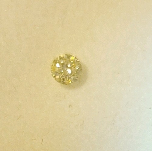 Natural Light Yellow Round Brilliant Diamond 0.14ct I1 Certified Natural Light Yellow Round Brilliant Diamond 0.14ct I1 Certified
