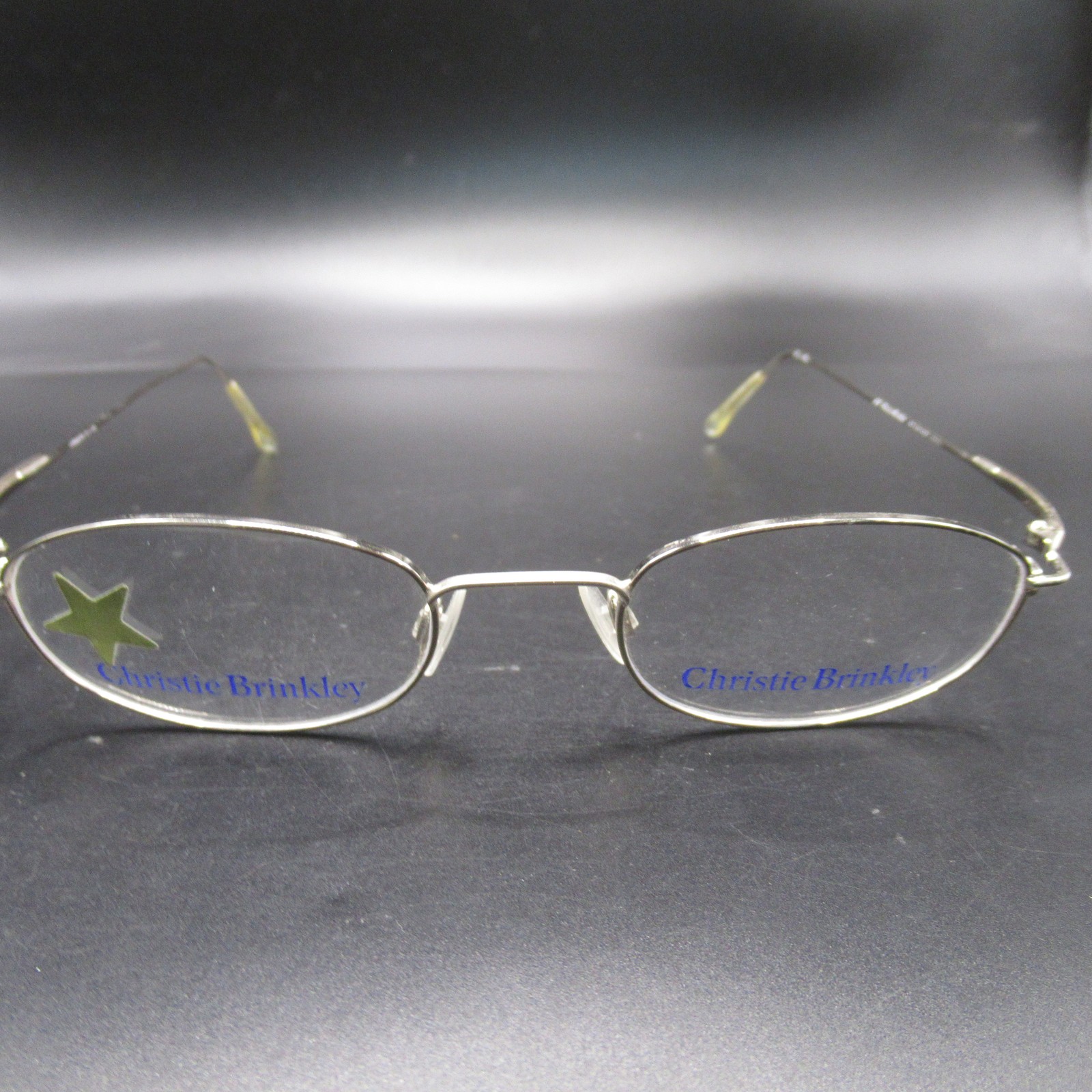 Christie Brinkley Eyeglass Frames Women\'s Oval Silver Metal Half Rimless
