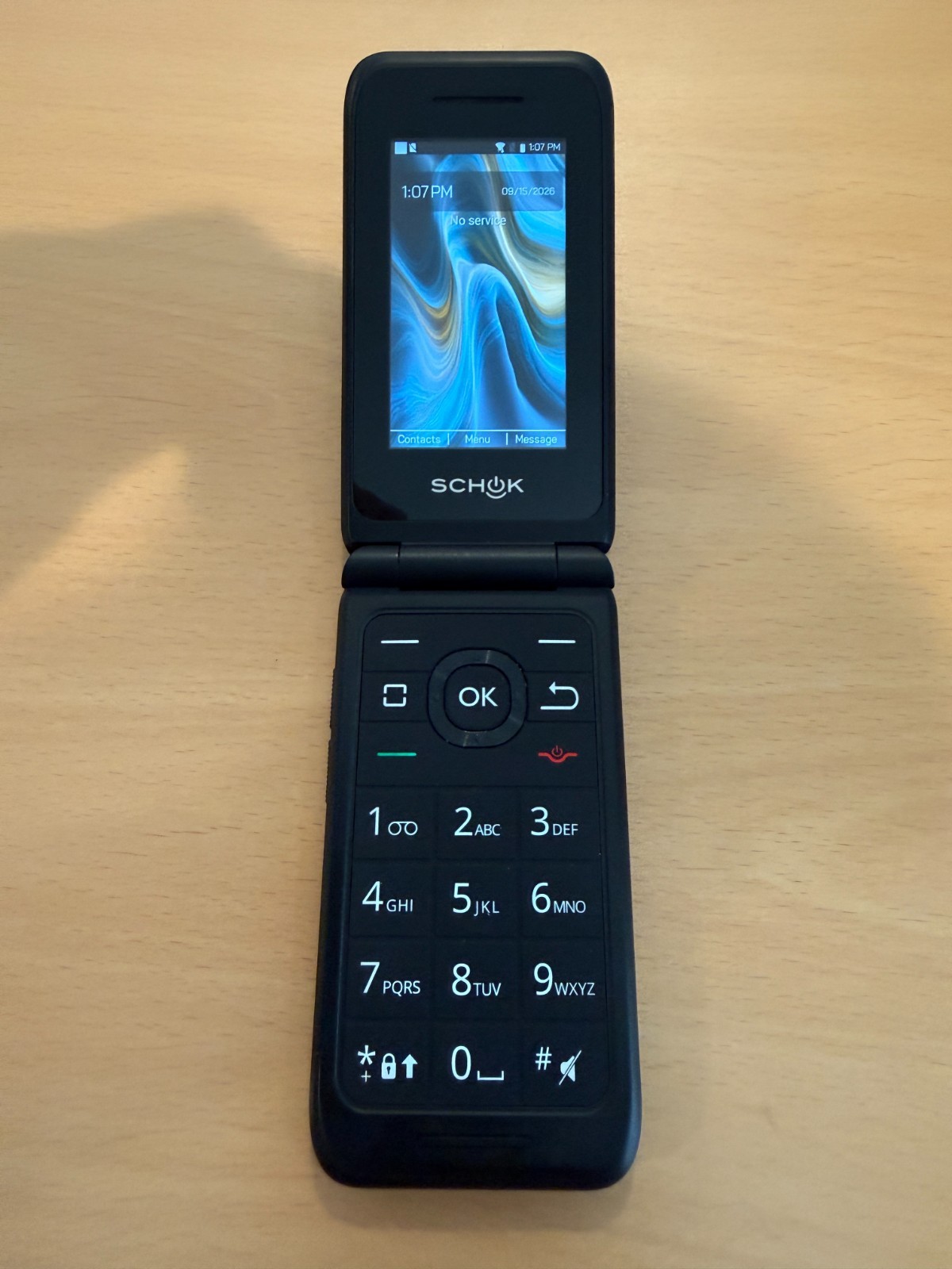 Schok Flip Phone 3.2 Display 8GB Black - Used Schok Flip Phone 3.2 Display 8GB Black - Used