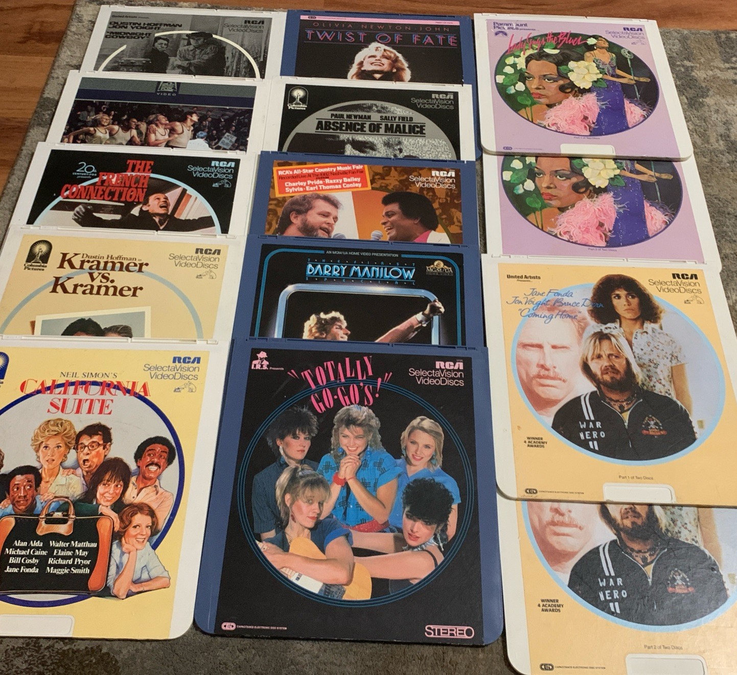 Lot Of 12 RCA SelectaVision CED Videodisc Movies 12 Inch Analog Discs.