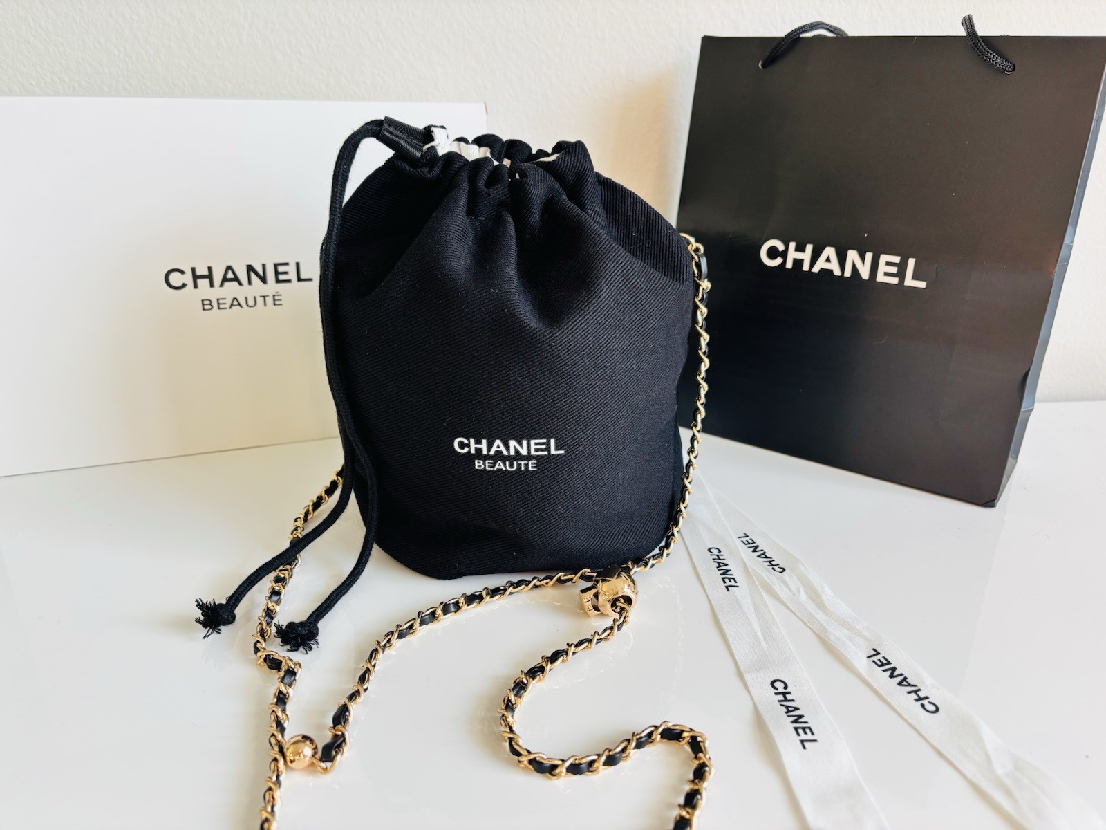 CHANEL Beautè Black Draw String Bucket Bag/crossbody w/ Gold Chain GWP
