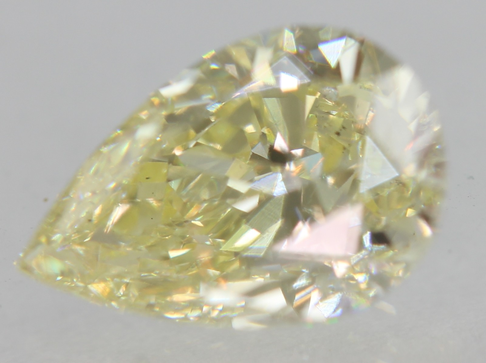 Cert 0.78 Carat Fancy Yellow VVS2 Pear Shape Natural Enhanced Diamond 7.5x5.05mm