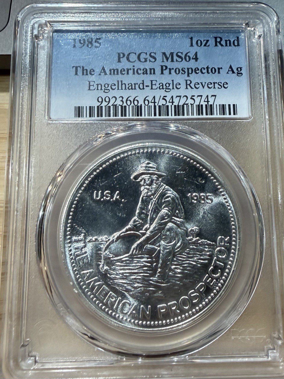 Engelhard 1985 1 oz Silver Round American Prospector PCGS MS64, 