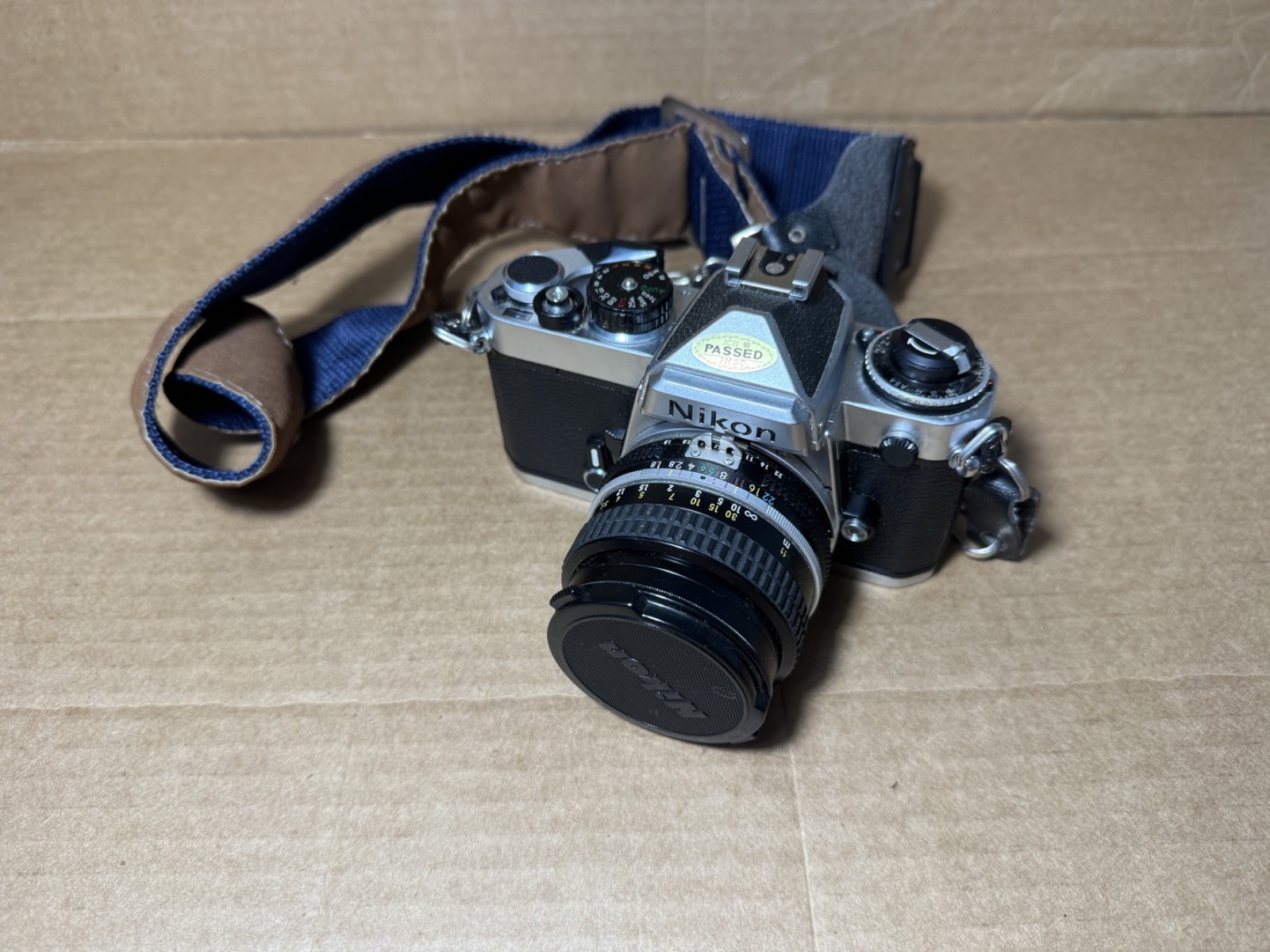 Nikon FE Silver Body, 35mm Film SLR w/50mm F1.8 Prime Lens And Cover With Strap Nikon FE Silver Body, 35mm Film SLR w/50mm F1.8 Prime Lens And Cover With Strap