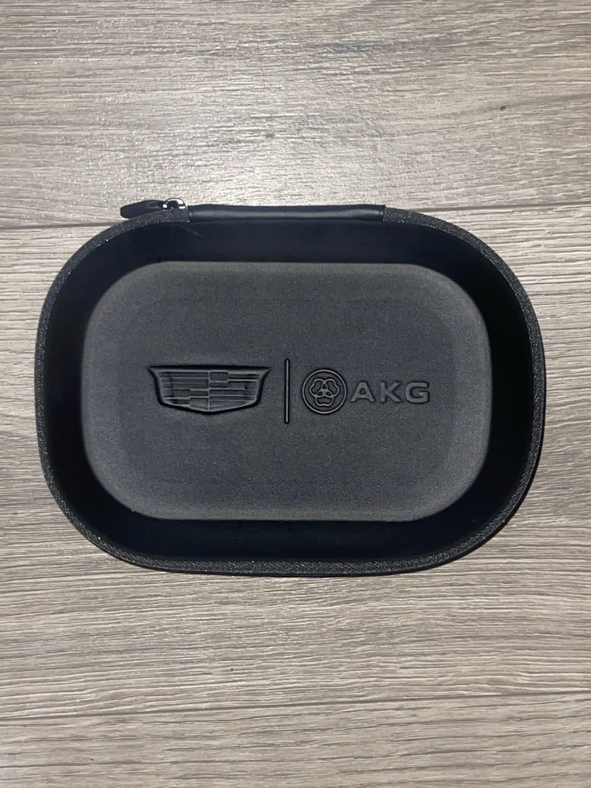 NEW OEM GENUINE PART # 19540629 Bluetooth Headphones with Cadillac Logo by AKG NEW OEM GENUINE PART # 19540629 Bluetooth Headphones with Cadillac Logo by AKG