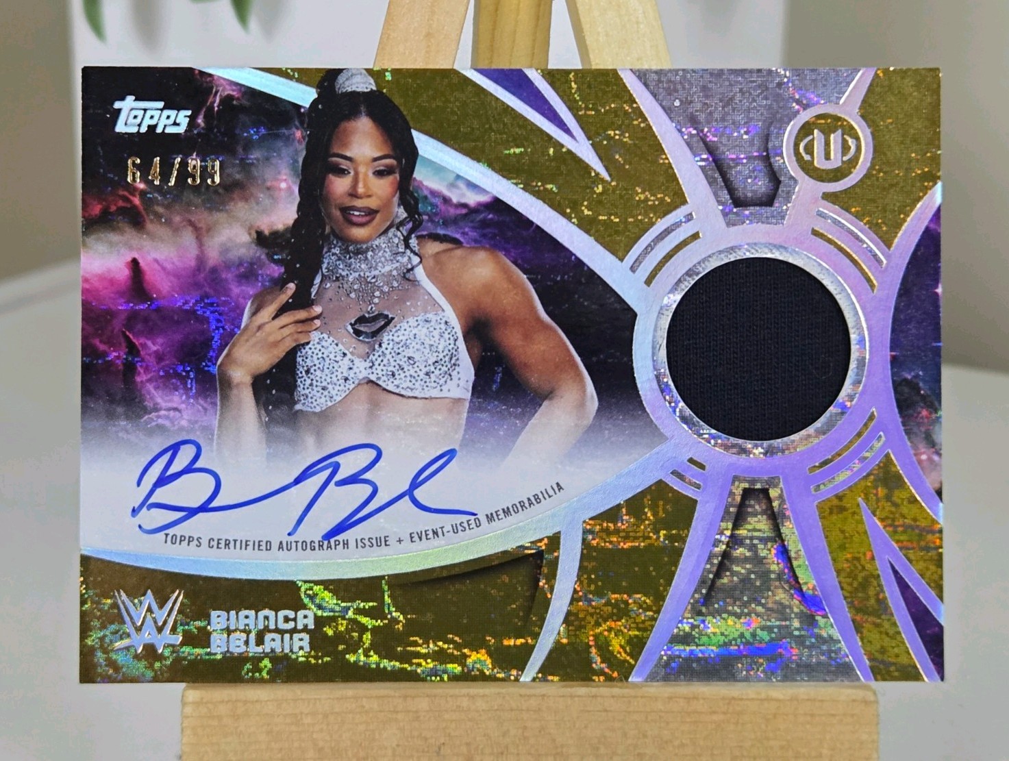 2026 Topps Universe WWE Bianca Belair Superstar Relic Auto Gold Stone 64/99 