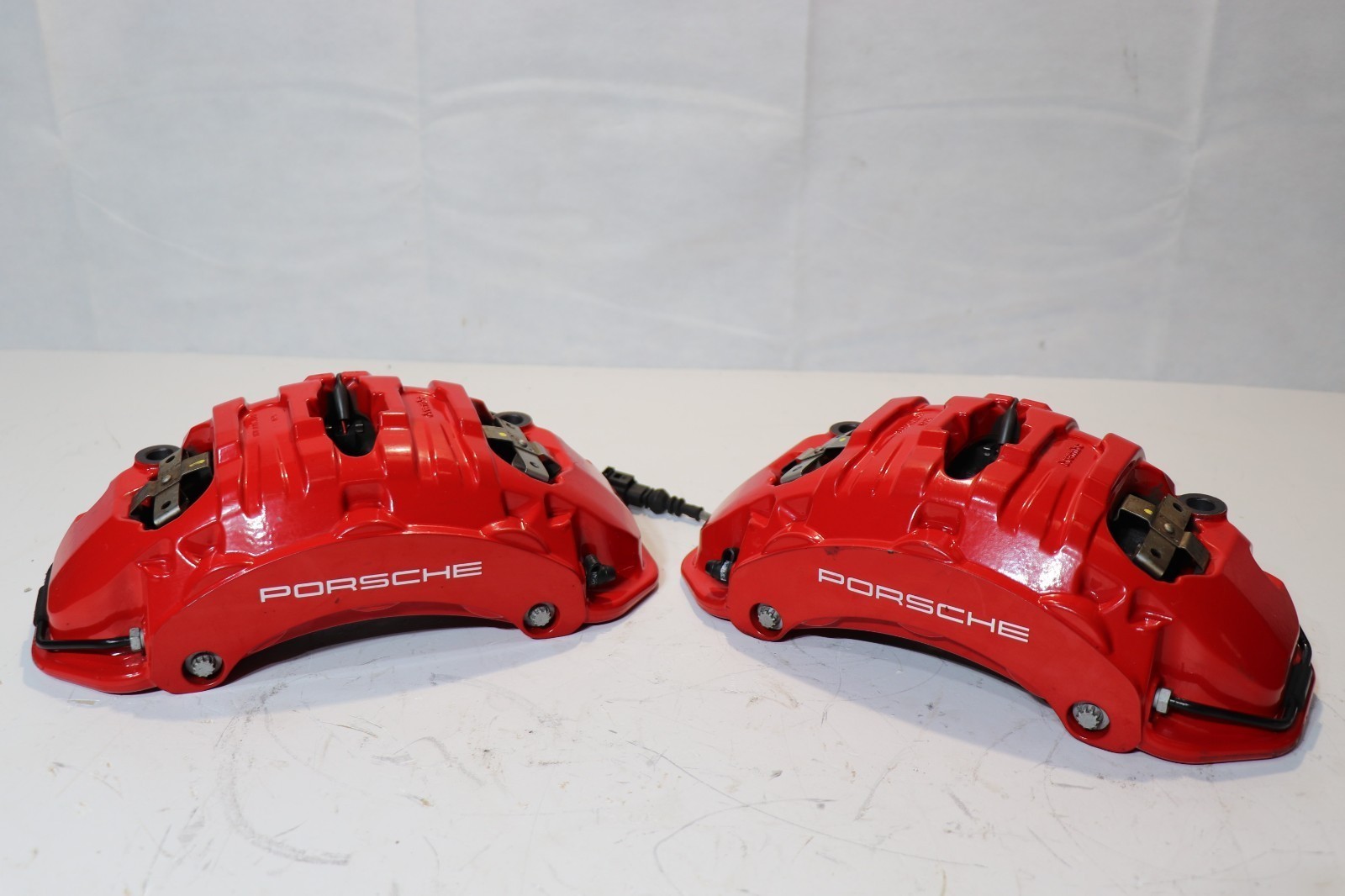 PORSCHE TAYCAN FRONT BREMBO RED BRAKE CALIPERS 6 POT PAIR 20A22106