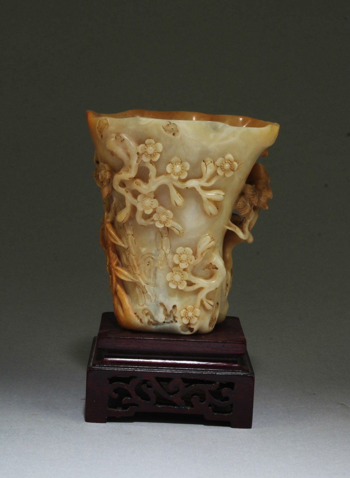 Chinese Carved Shoushan Cup. Comes fitted with a wooden stand Chinese Carved Shoushan Cup. Comes fitted with a wooden stand