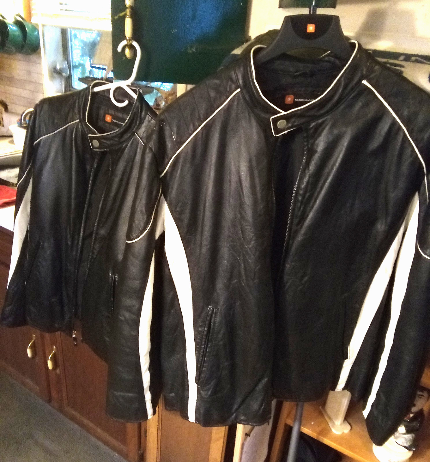 Two matching Wilsons Genuine Leather Black Biker Riding Jackets 2XL and MED Two matching Wilsons Genuine Leather Black Biker Riding Jackets 2XL and MED