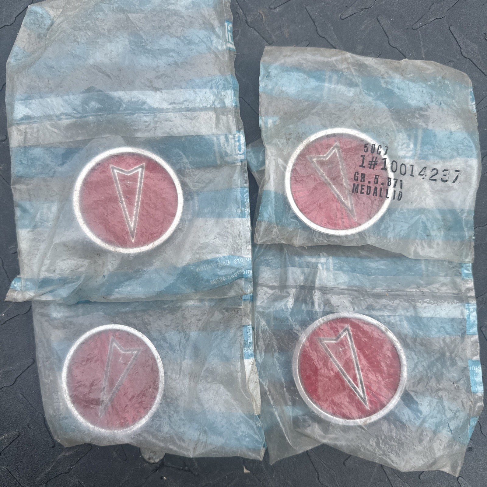 Four ORIGINAL NOS 1978-1984 PONTIAC WHEEL CENTER CAP MEDALLION #10014237 