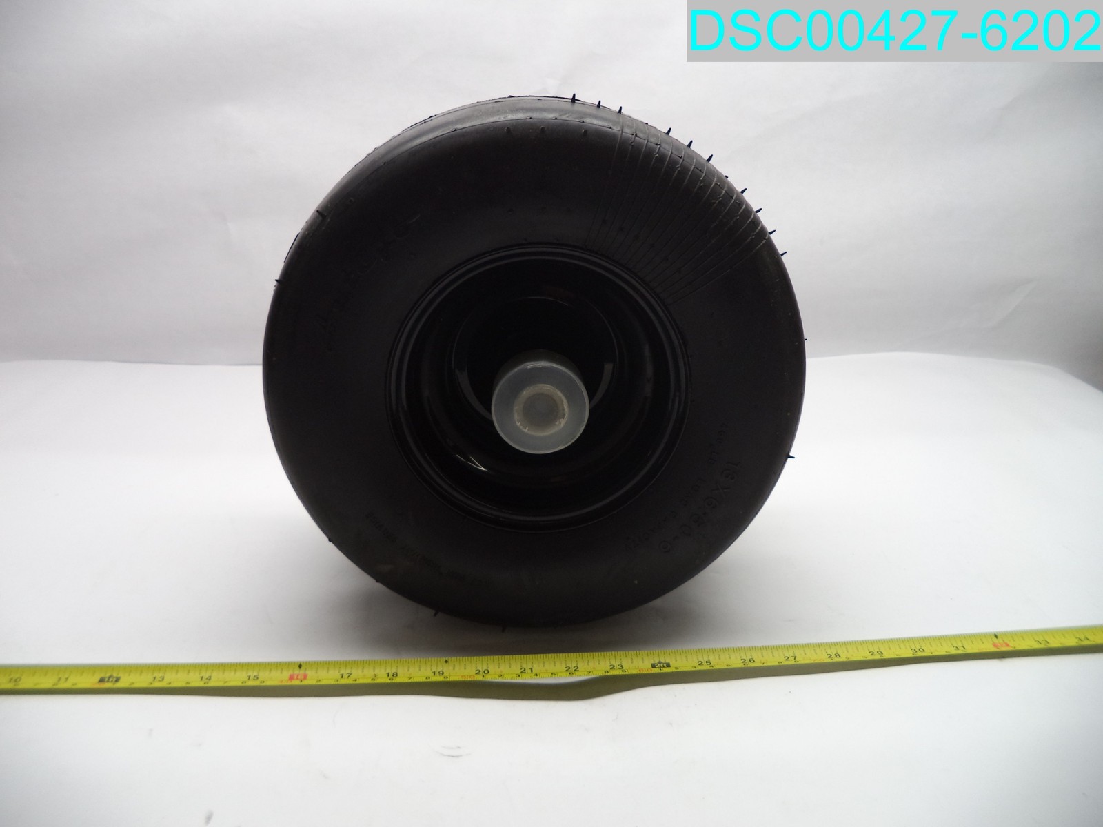Antego 13x6.50-6 Smooth Tread Flat Free Tire with grease fitting, 9/16\