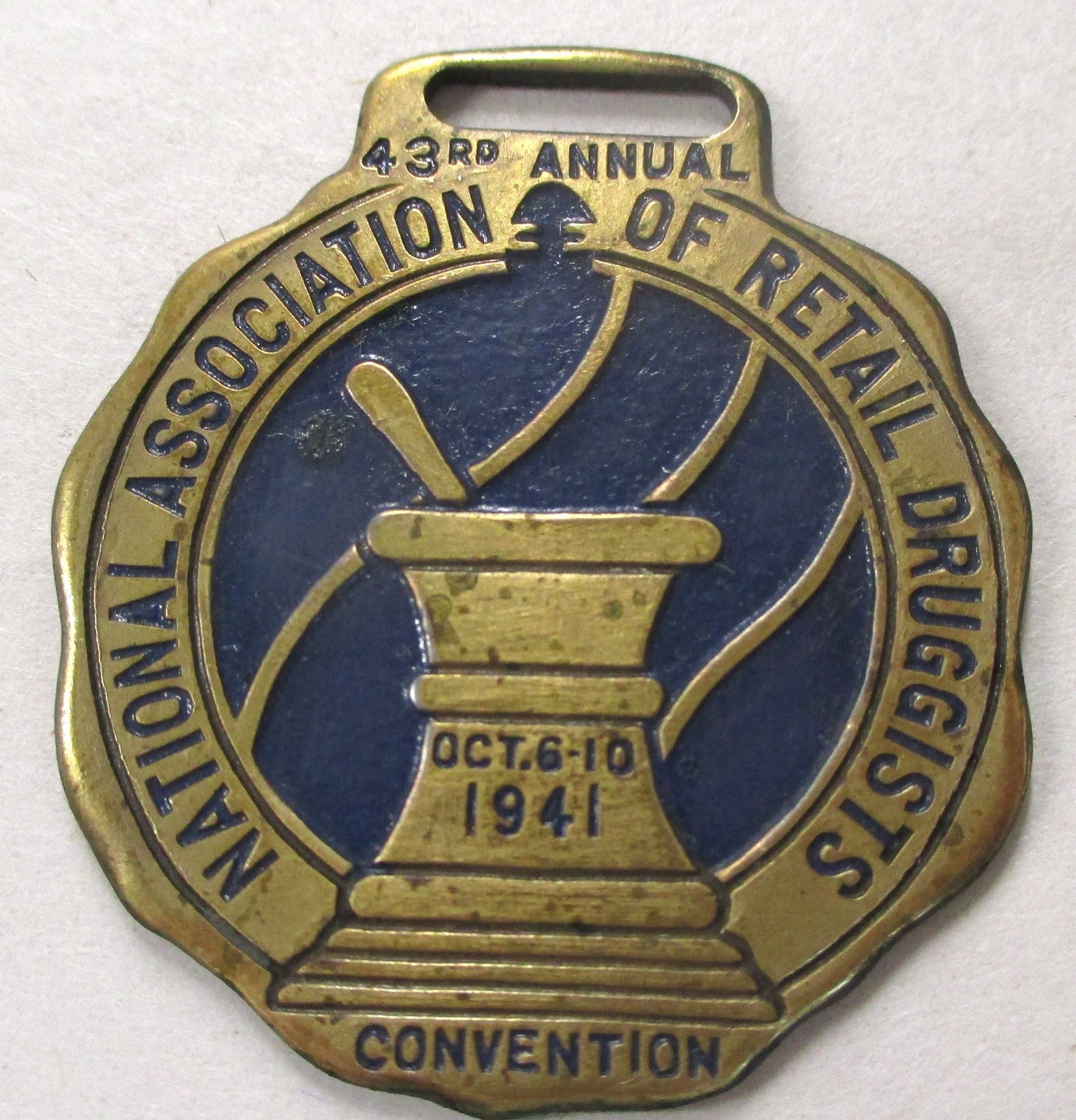 VINTAGE 1941 NATIONAL ASSOCIATION OF RETAIL DRUGGISTS ENAMEL WATCH FOB