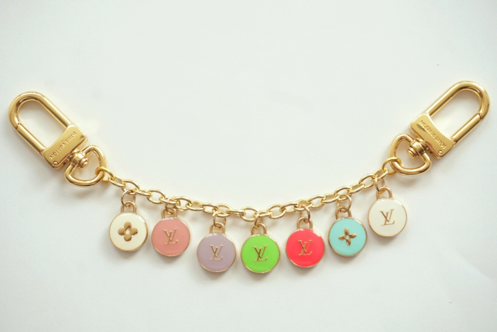 LV Keychain gold / pink/ colored LV Keychain gold / pink/ colored