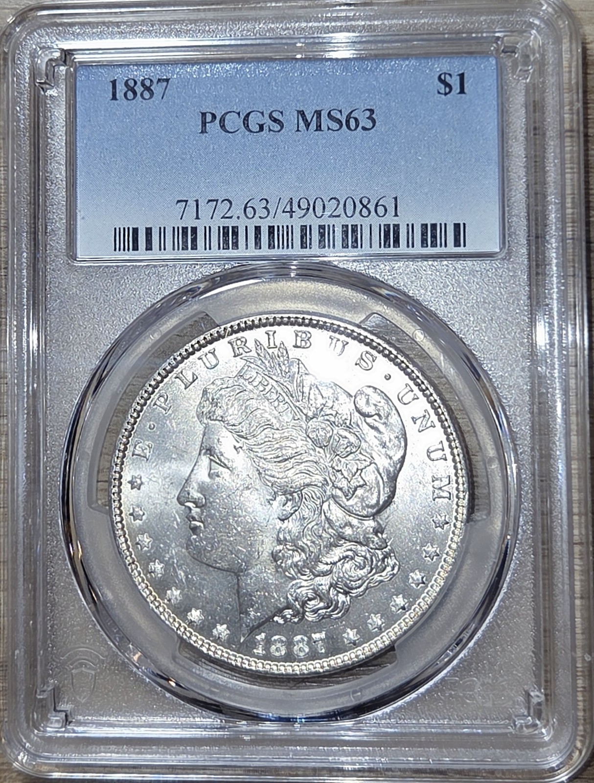 1887 $1 PCGS MS63 - Morgan Dollar