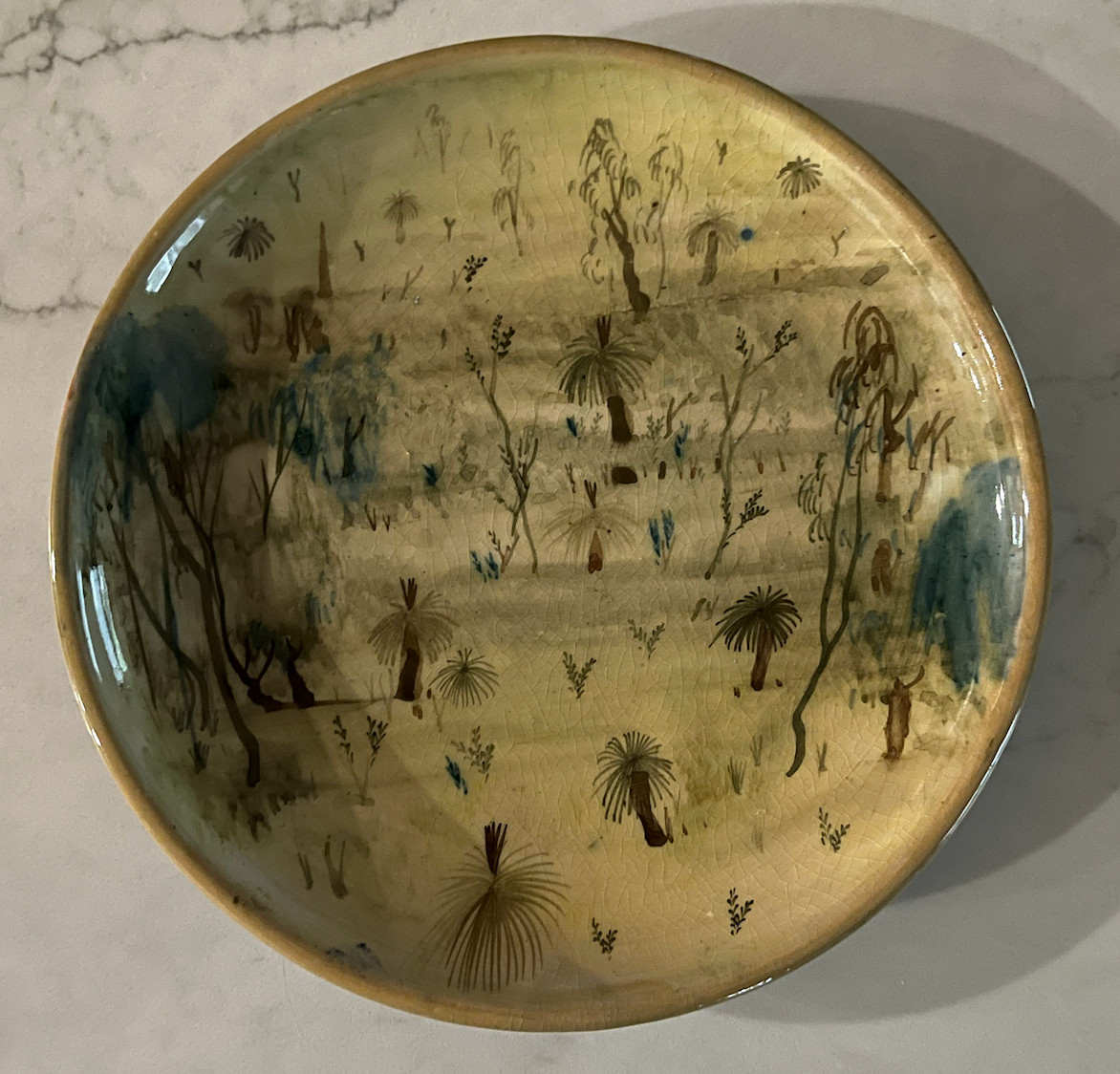 NEIL DOUGLAS (AMB) DECORATED SCENES OF AUSTRALIAN BUSH EARTHENWARE PLATE