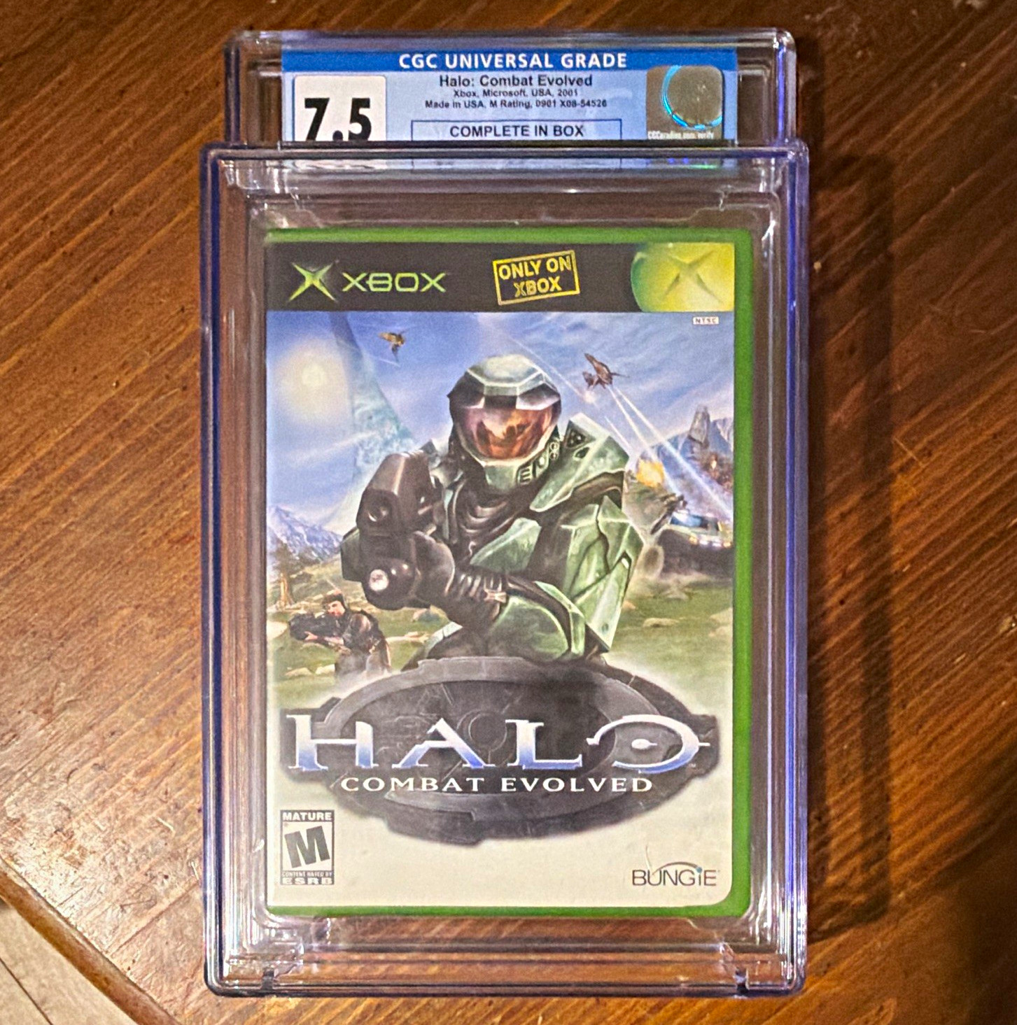Halo: Combat Evolved graded Xbox CGC 7.5 Complete in Box NTSC-U/C M 2001 Halo: Combat Evolved graded Xbox CGC 7.5 Complete in Box NTSC-U/C M 2001