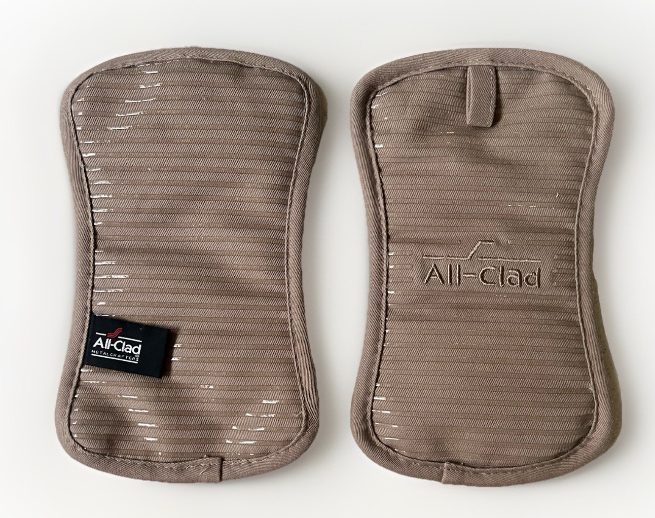 All-Clad Cappuccino Premium Pot Holder & Hot Pad: Heat Resistant to 500 Degrees All-Clad Cappuccino Premium Pot Holder & Hot Pad: Heat Resistant to 500 Degrees