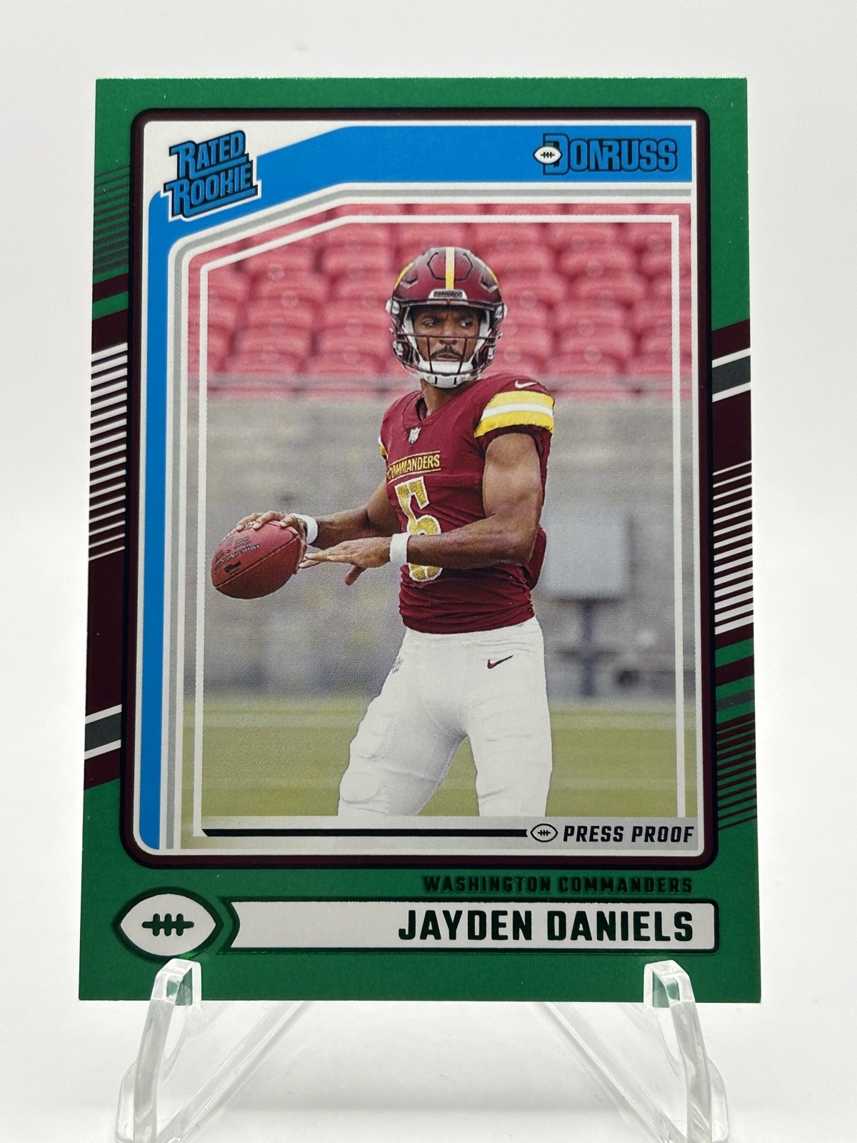 2024 Panini Donruss - Rated Rookie Jayden Daniels #389 Press Proof Green (RC)