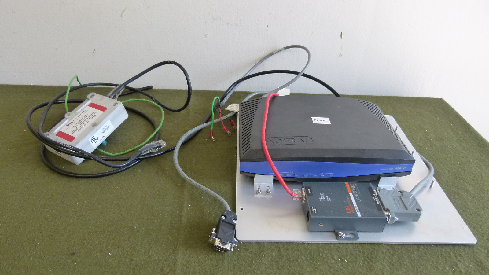 Assembled Set: Adtran NetVanta 3200, Lantronix UDS1100, M-Ti Meter-Treater, etc.
