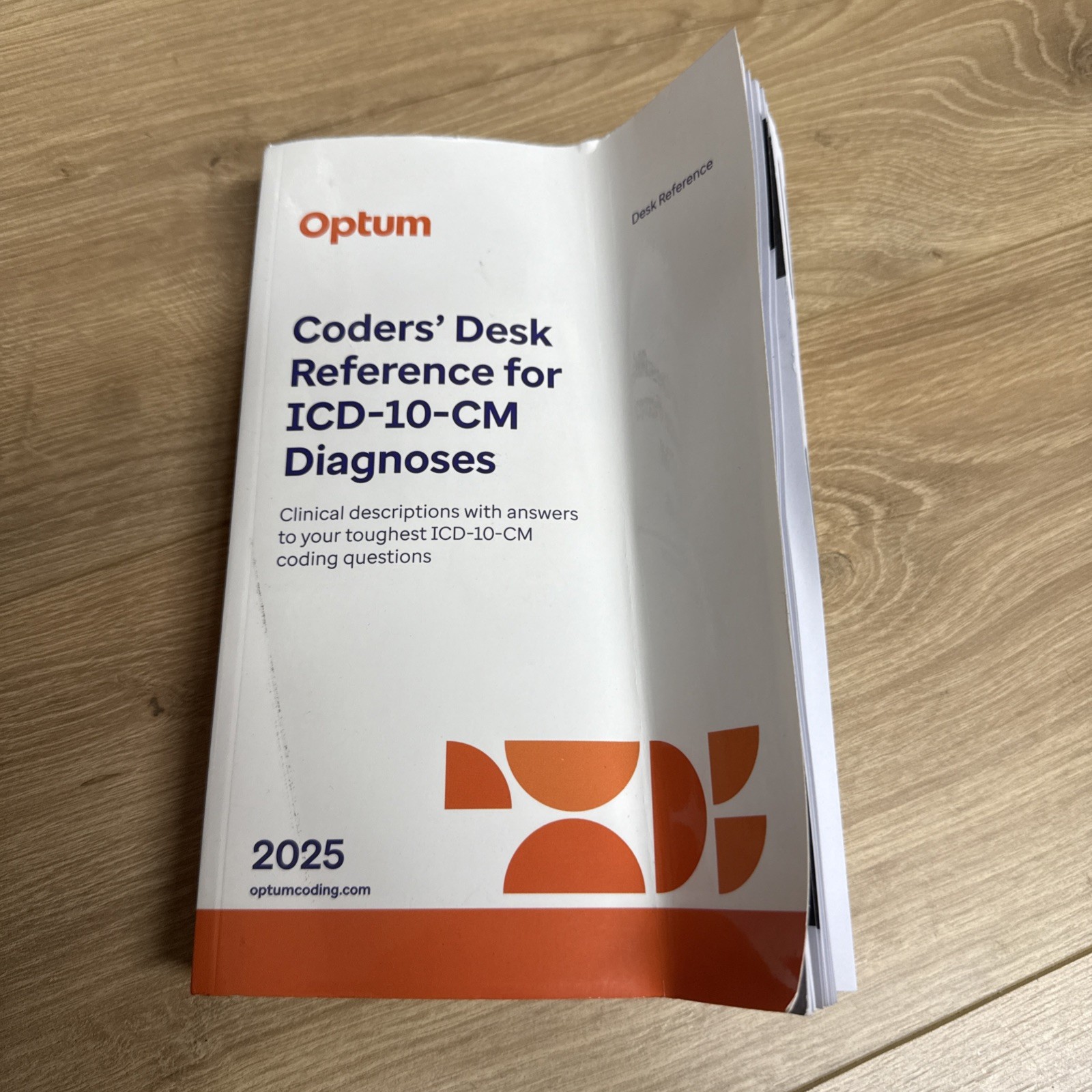 2025 Coders' Desk Reference for Diagnoses ICD-10-CM by Optum BentCoverNoHiglight