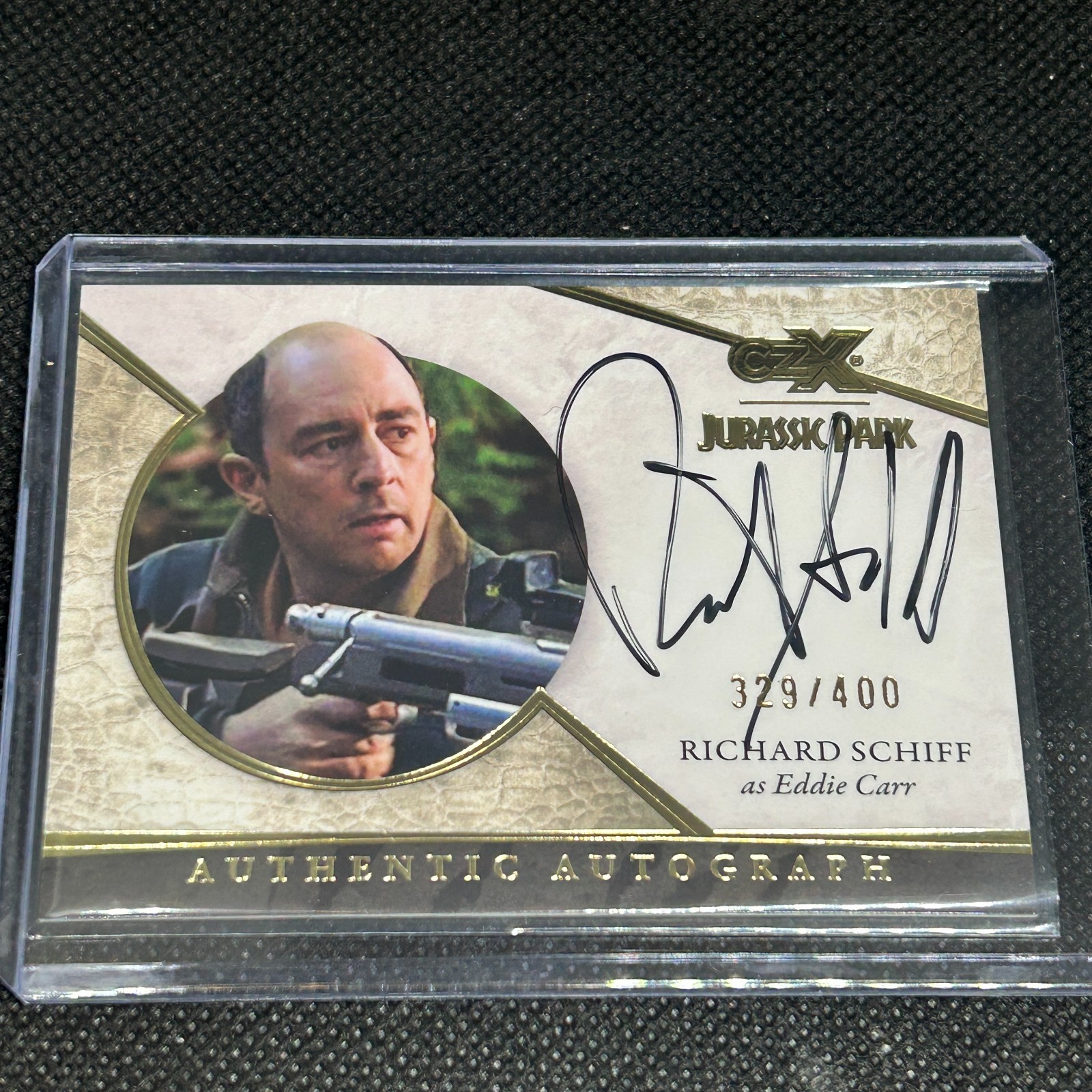 2026 JURASSIC PARK CRYPTOZOIC CZX RICHARD SCHIFF AS EDDIE CARR AUTO #d 329/400