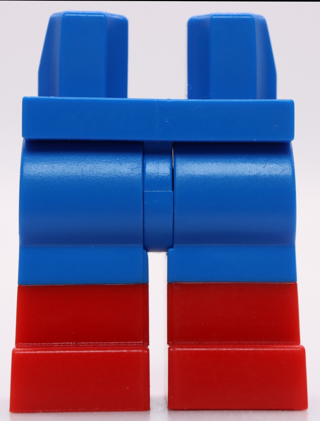 Lego Blue Minifig Hips and Legs with Red Boots Pattern