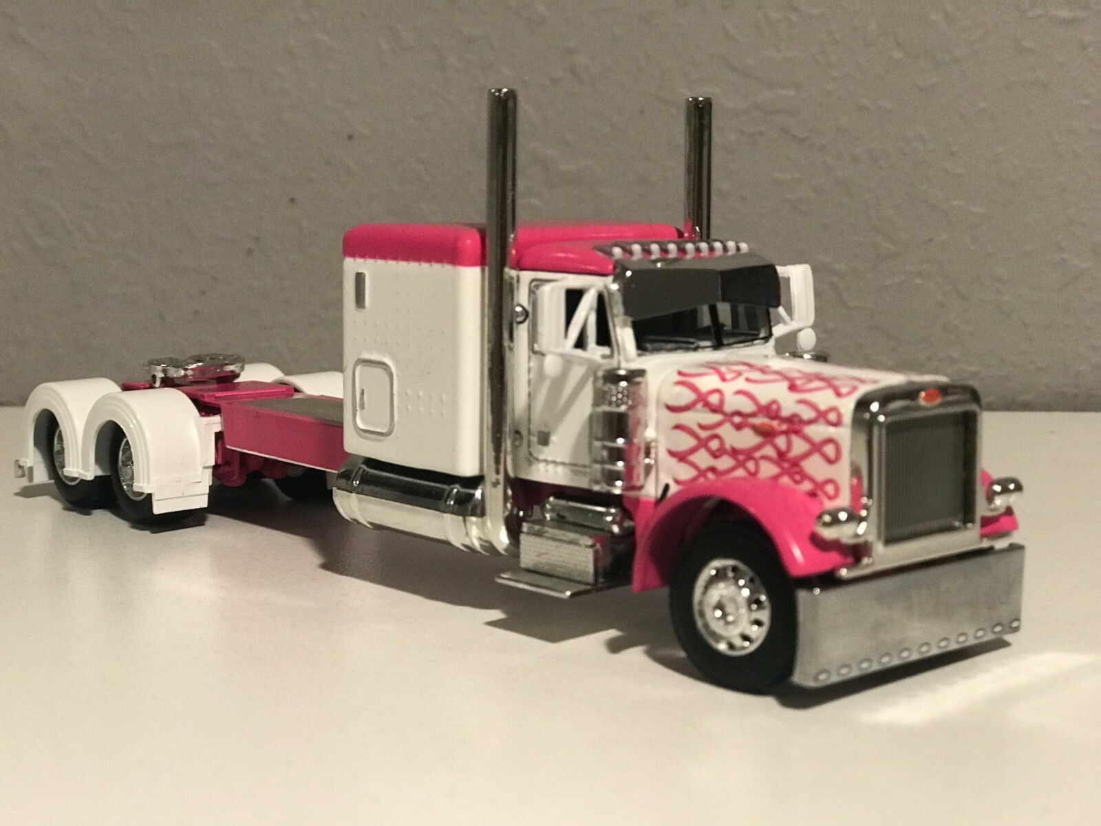 NEW 1/64 DCP PINK PETERBILT 379 60\