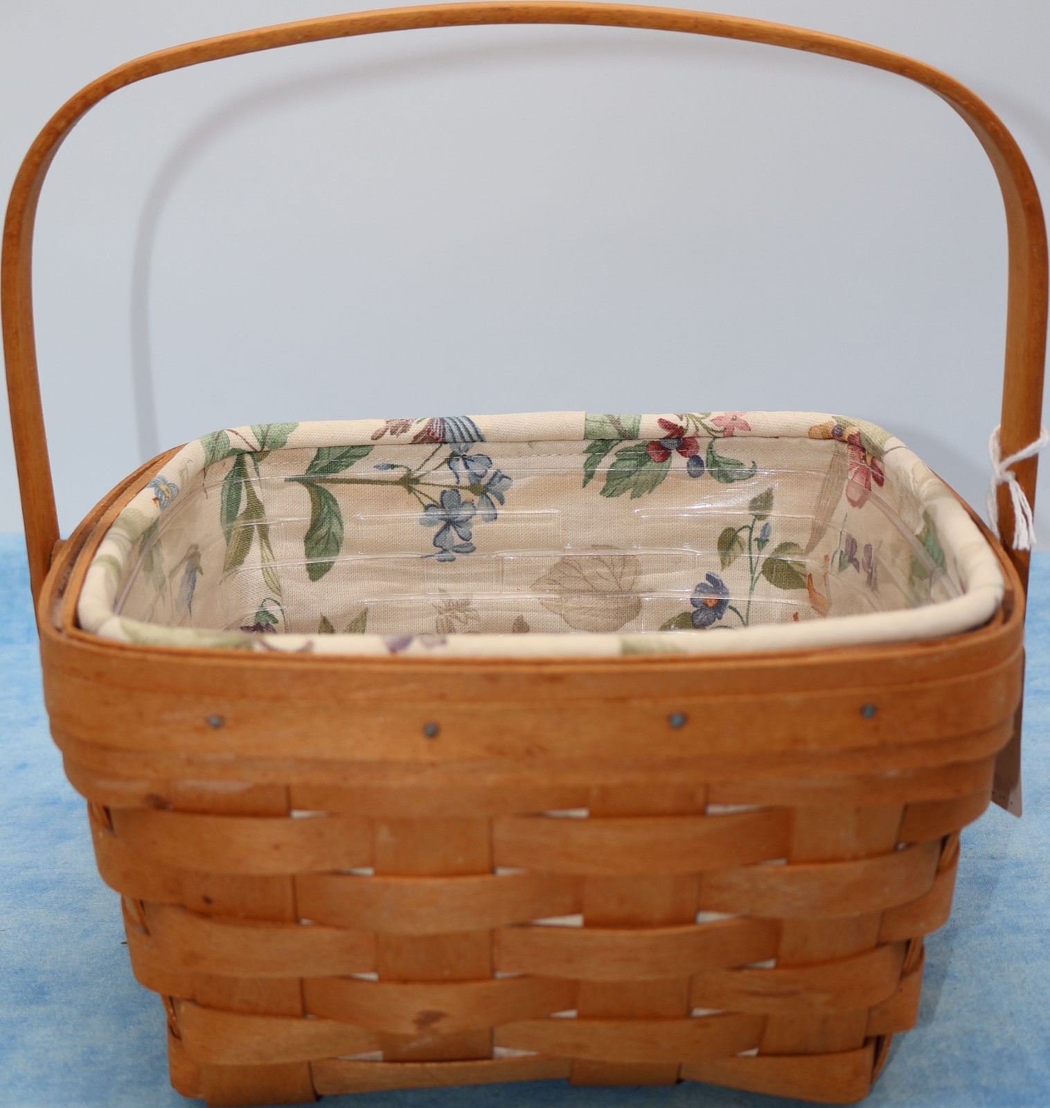 Longaberger 1997 Large Berry Basket, Floral Liner, Protector, and Brochure Longaberger 1997 Large Berry Basket, Floral Liner, Protector, and Brochure