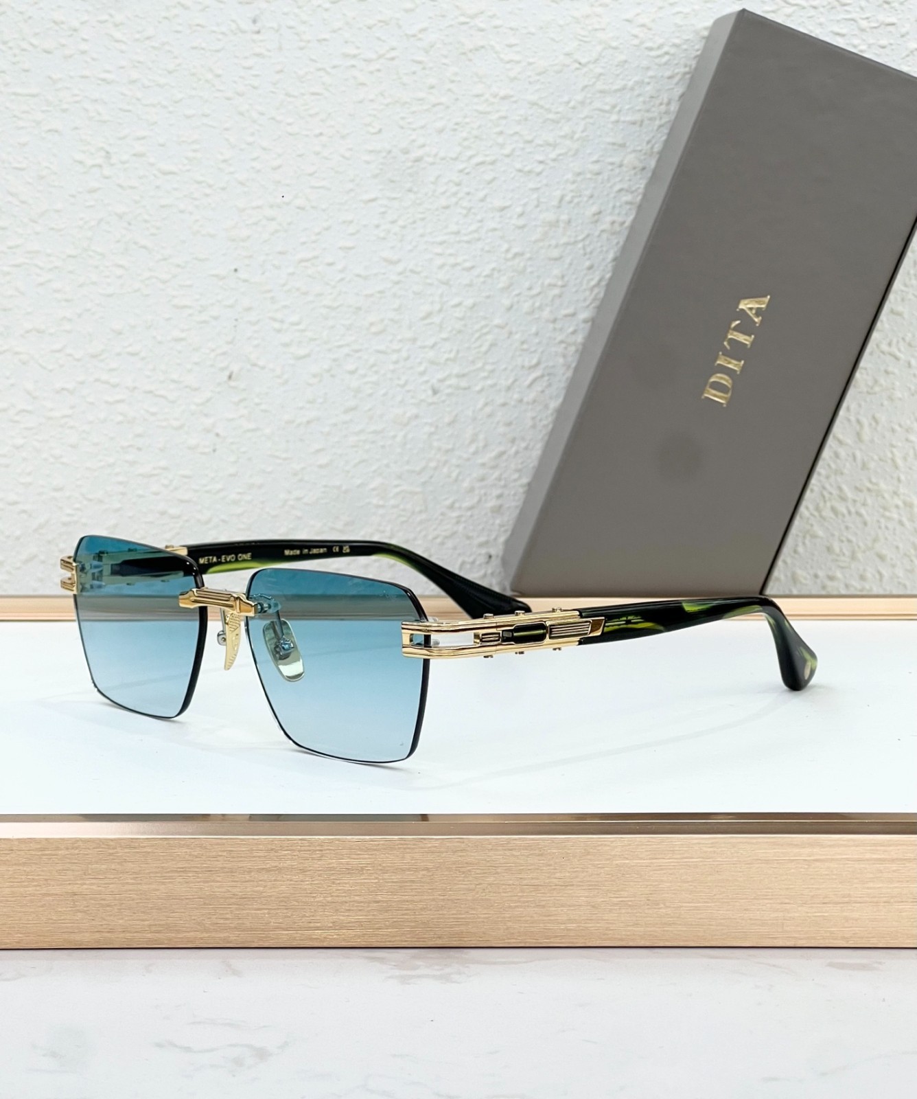 DITA Meta-Evo One Sunglasses Blue Gradient Lens Gold Black Frame Rimless