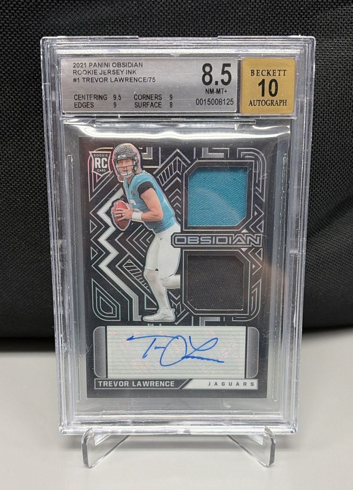 2021 Panini Obsidian RC Trevor Lawrence #RJI-TL Electric Etch Orange /50 BGS 8.5