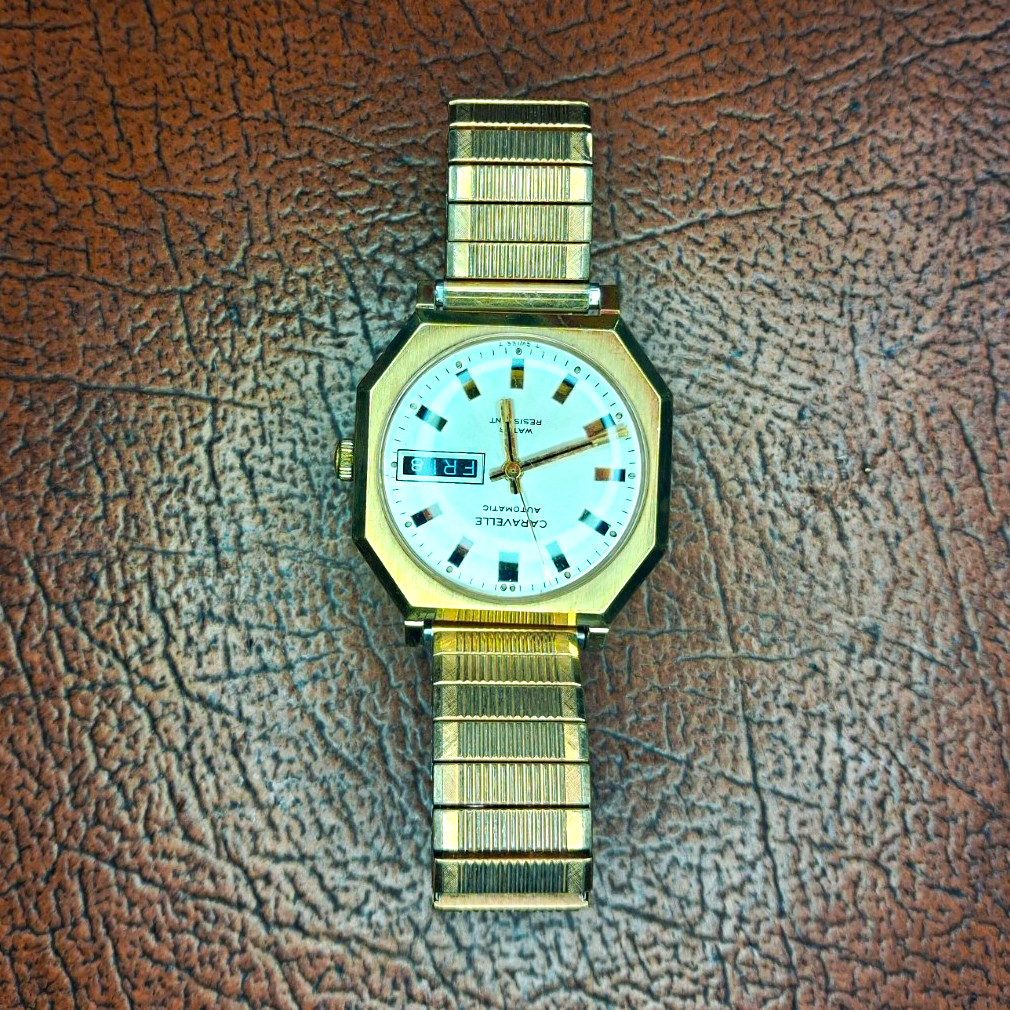 Caravelle Automatic Men\'s Octagon Day/Date Silver Dial Gold/Silver Bracelet