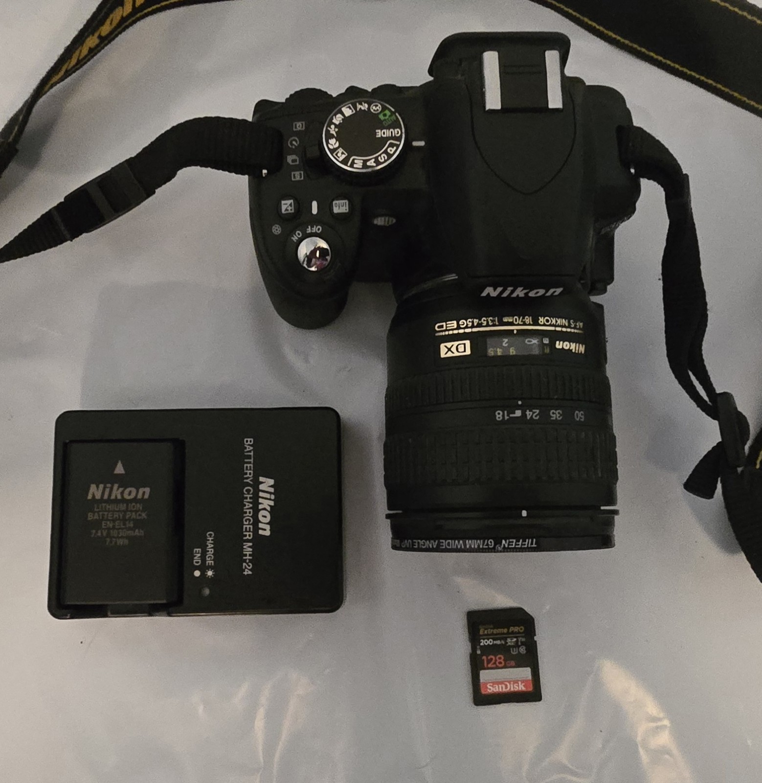 Nikon D3100 DSLR Camera Bundle w/ 18-70mm Lens, Battery/Charger, 128GB & Bag