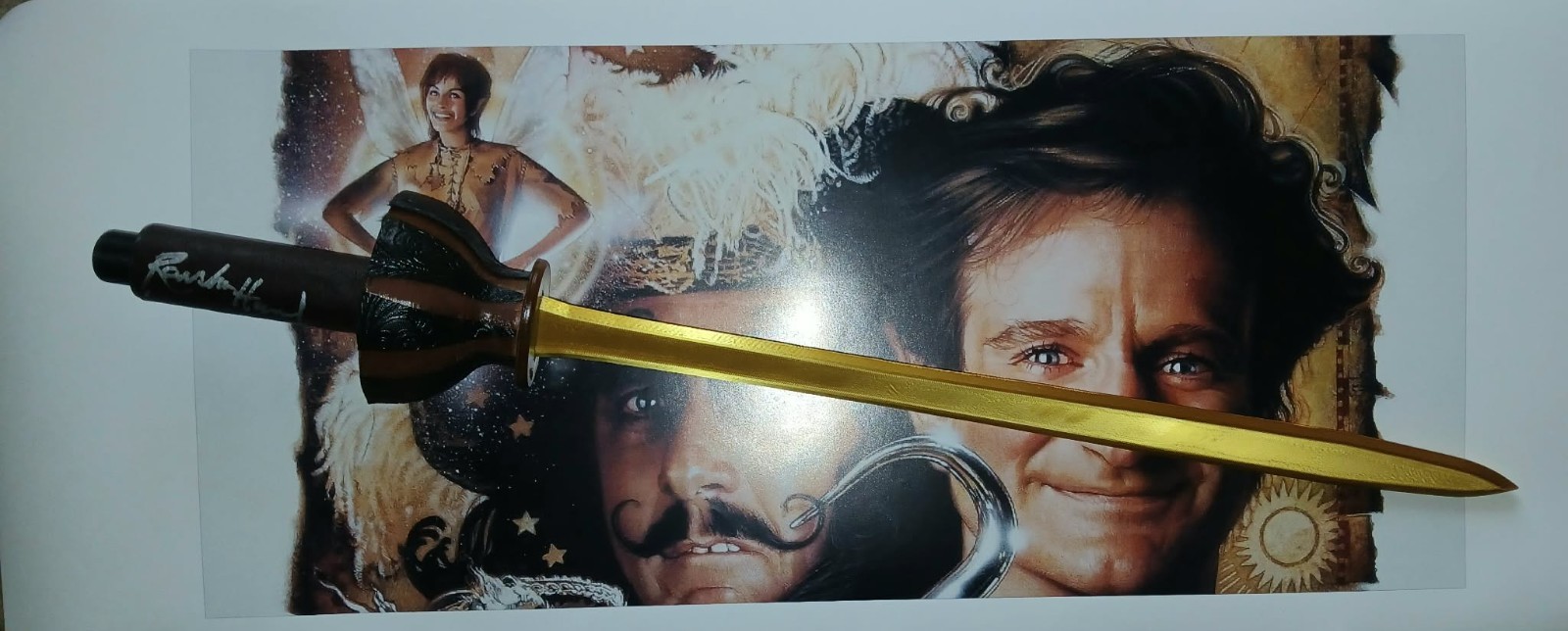 Own a Piece of Hook Movie Magic —Autographed Signed Peter Pan Mini Swords.