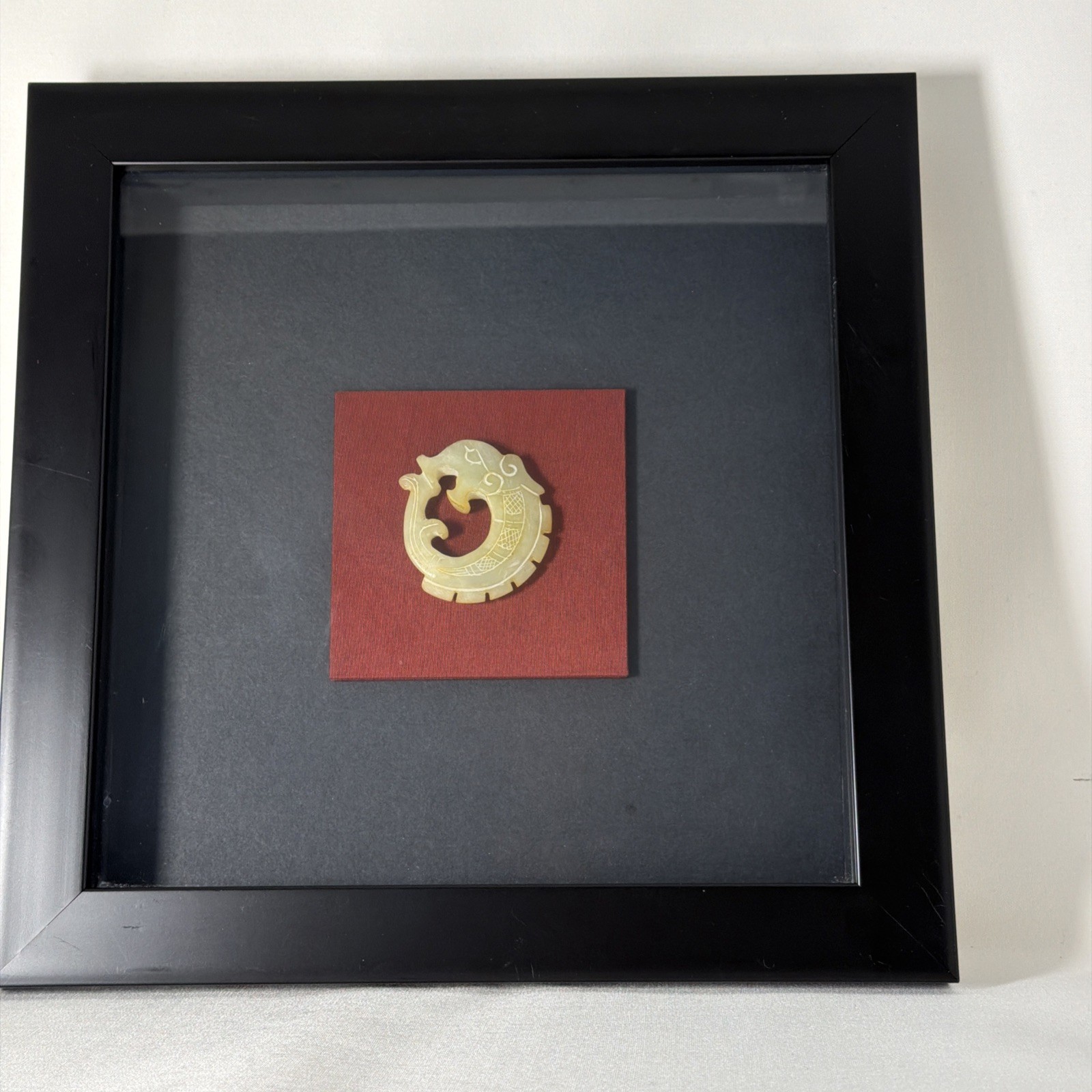 Framed Mounted Chinese Jade or Light Green Stone Handcarved Fish-Dragon Pendant
