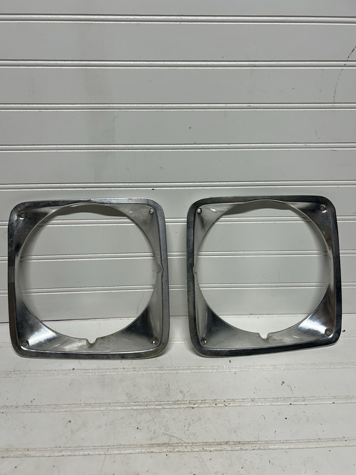69-72 Chevy C10 Truck LH/RH Driver & Passeneger Headlight Bezels Pair OEM 69-72 Chevy C10 Truck LH/RH Driver & Passeneger Headlight Bezels Pair OEM
