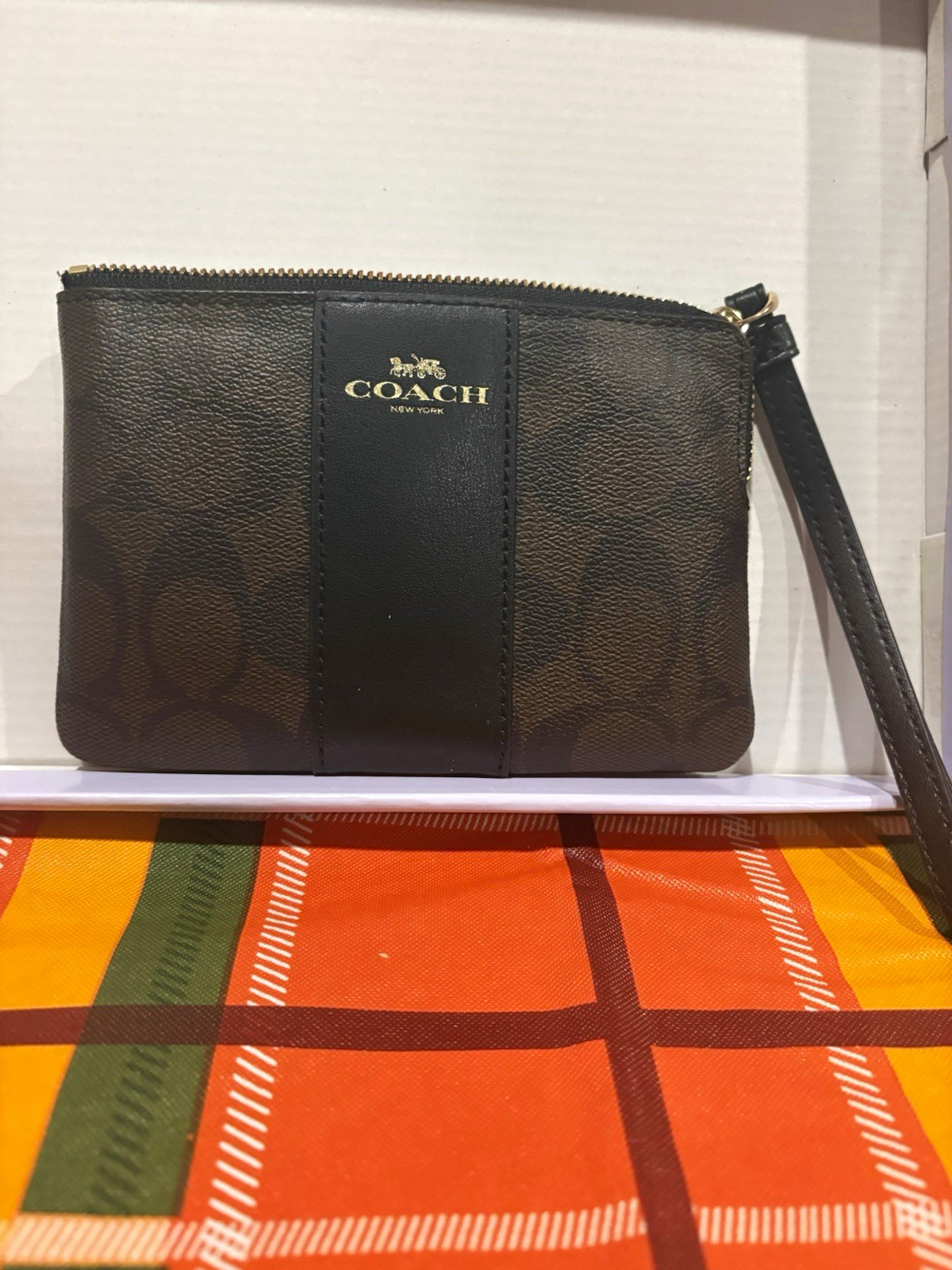 Coach Signature Brown Logo Zip Wristlet Pouch w/ Black Strap, Gold Hardware Coach Signature Brown Logo Zip Wristlet Pouch w/ Black Strap, Gold Hardware