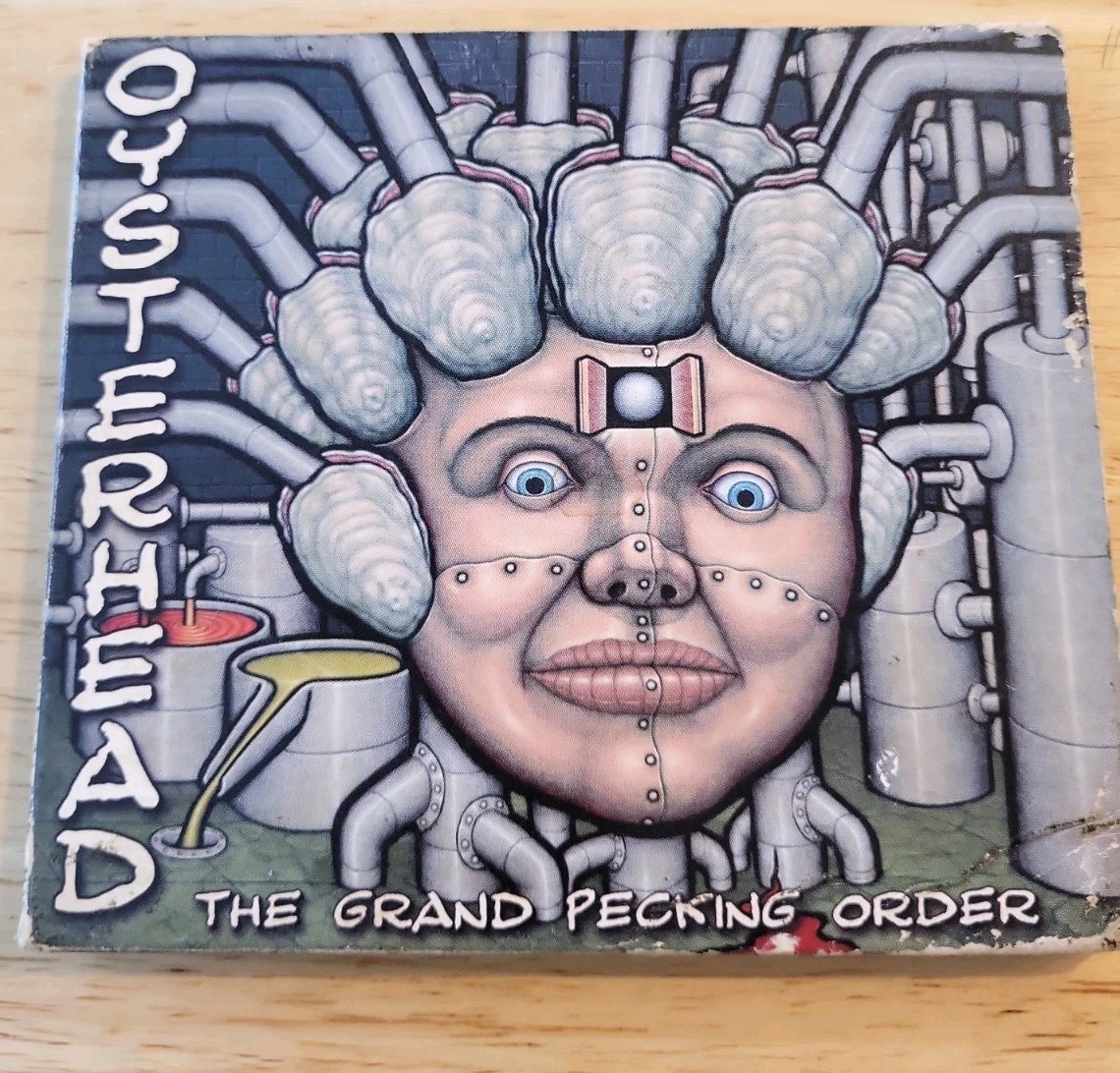 The Grand Pecking Order by Oysterhead (CD, Oct-2001, Elektra) digipak The Grand Pecking Order by Oysterhead (CD, Oct-2001, Elektra) digipak