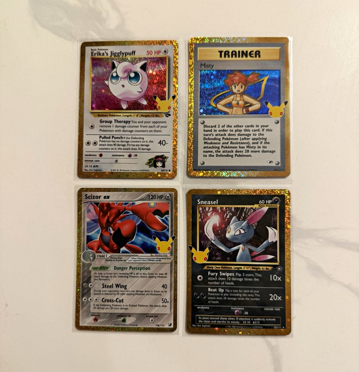 Erika\'s Jigglypuff 69/132,misty trainer  18/132,scizor ex 108/115,Sneasel25/111