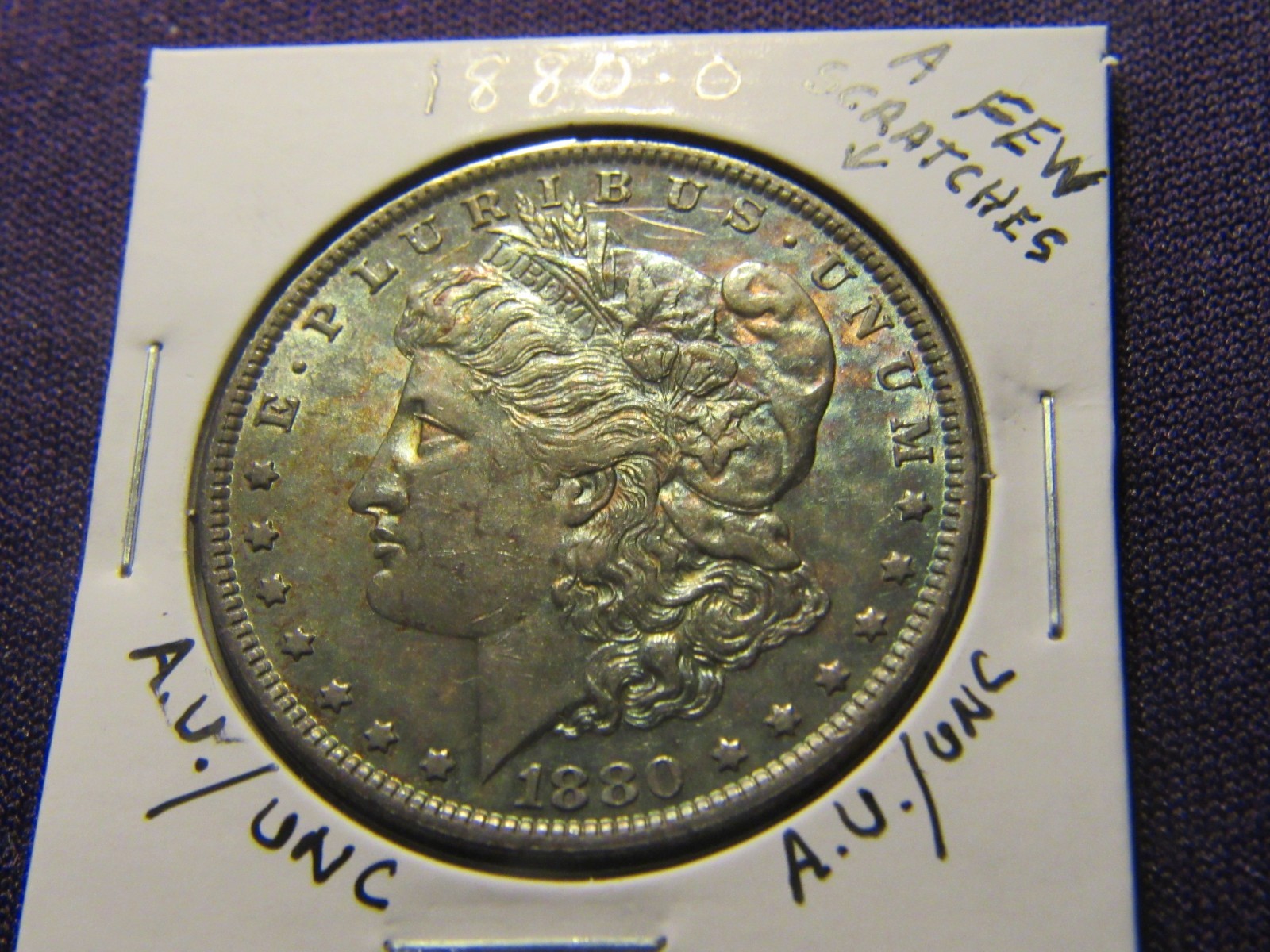 1880-O Morgan dollar A.U. / UNC with a couple of scratches on the obverse 1880-O Morgan dollar A.U. / UNC with a couple of scratches on the obverse