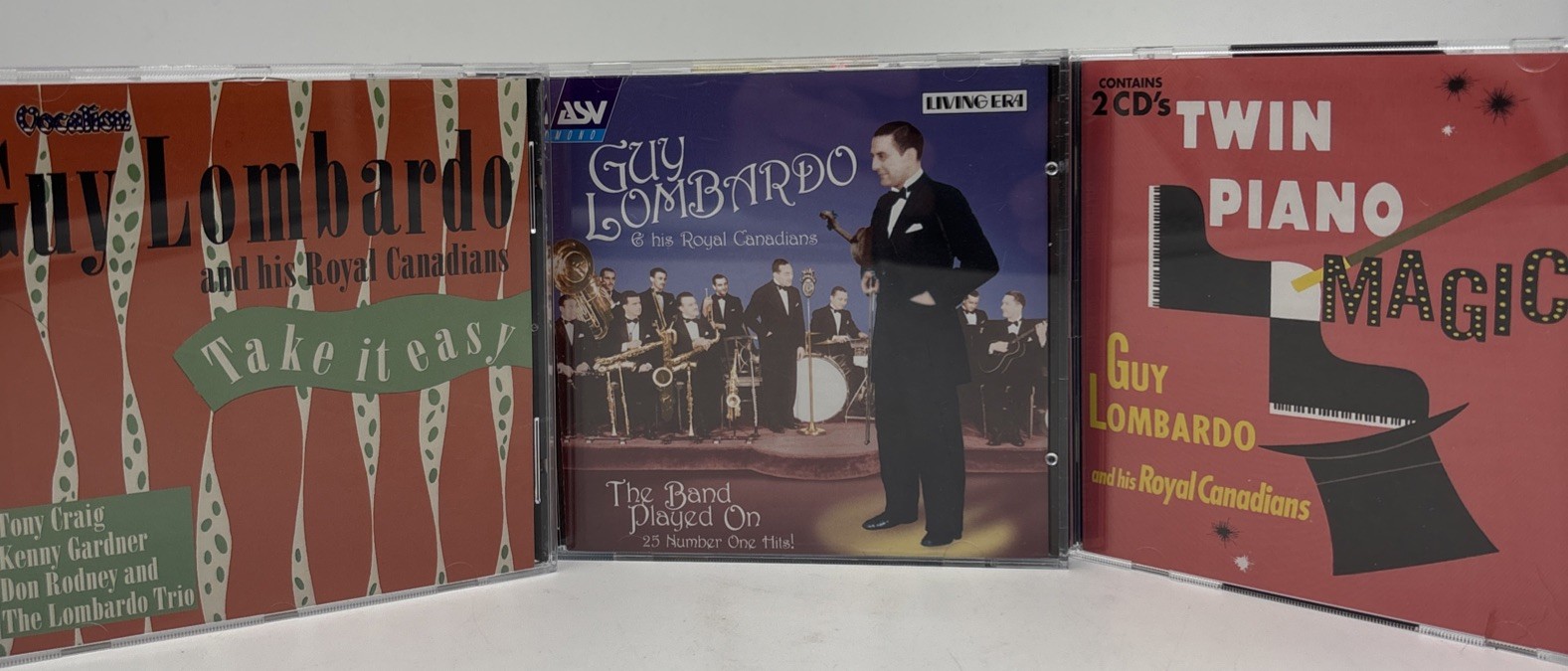 Guy Lombardo-Twin Piano-Band Played On-Take It Easy-1927-1950 Lot of 3 CDs. Guy Lombardo-Twin Piano-Band Played On-Take It Easy-1927-1950 Lot of 3 CDs.