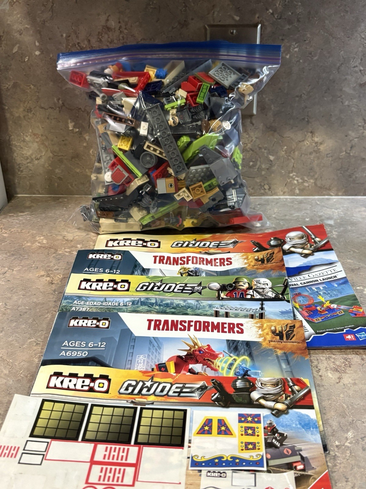 Kree-O Lot, Transformers And GI Joe, Includes Figurines And Stickers,