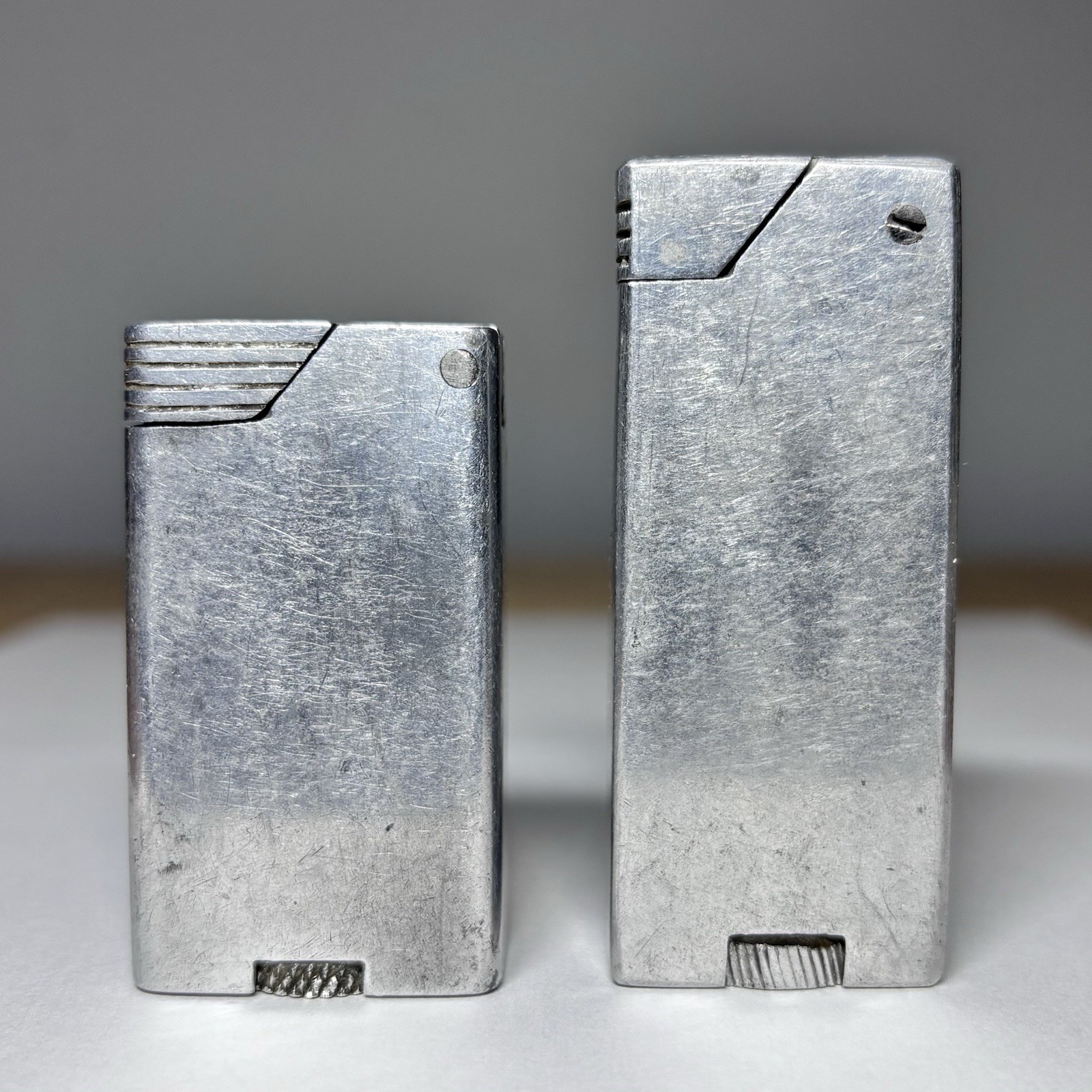 Vintage Lot of 2 Lift Arm Petrol Metal Block Pocket Lighters c. 1940s–1950s