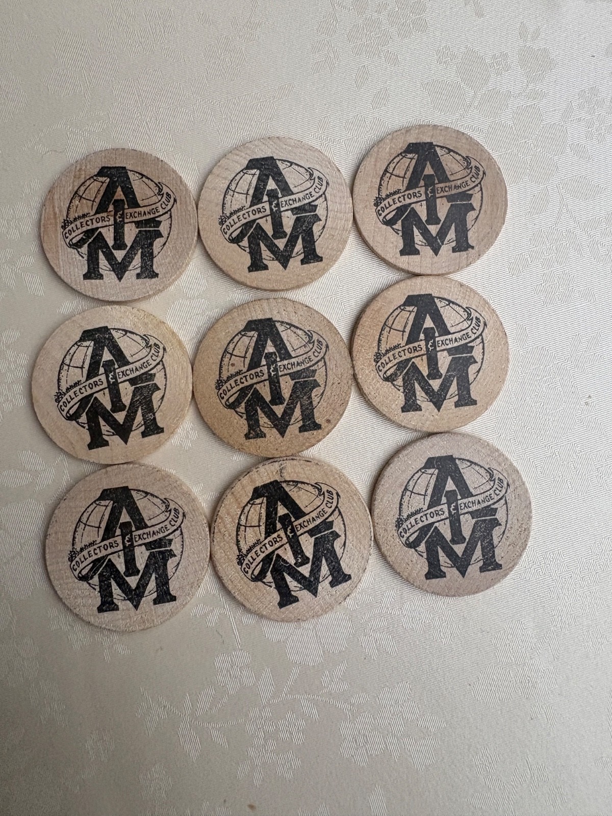 9 AMERICAN INTERNATIONAL MATCHBOX AIM WOODEN COINS HAROLD\'S PLACE