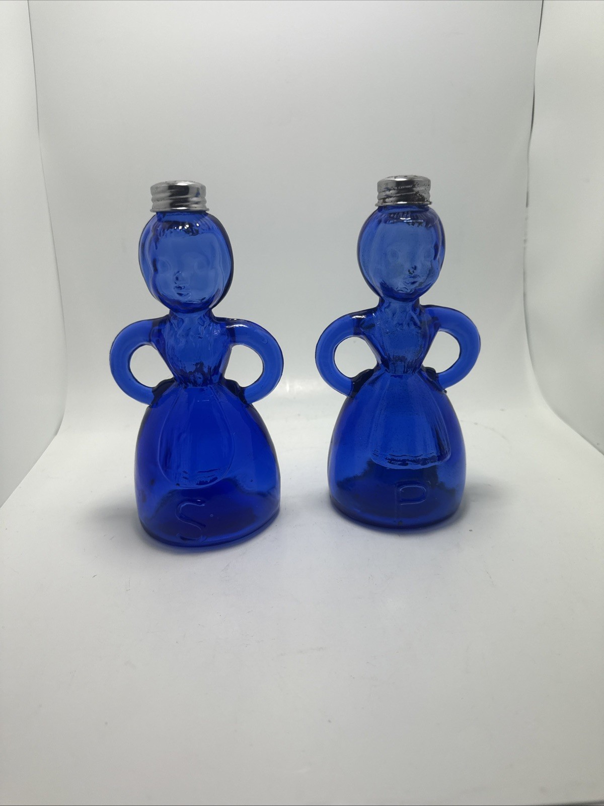 Vintage Cobalt blue glass Merry Maid salt and pepper shakers with top Vintage Cobalt blue glass Merry Maid salt and pepper shakers with top