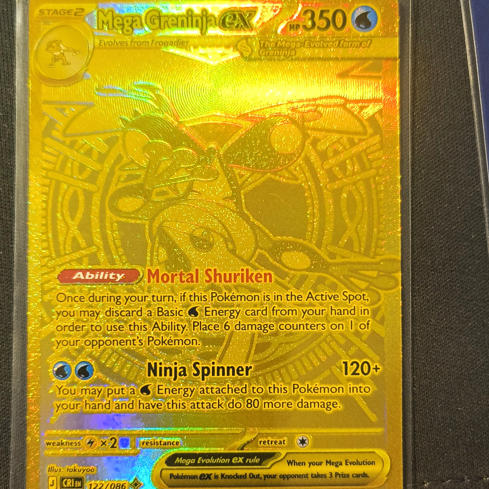 This is a Mega Greninja ex (#122/086) Mega Hyper Rare gold secret rare.