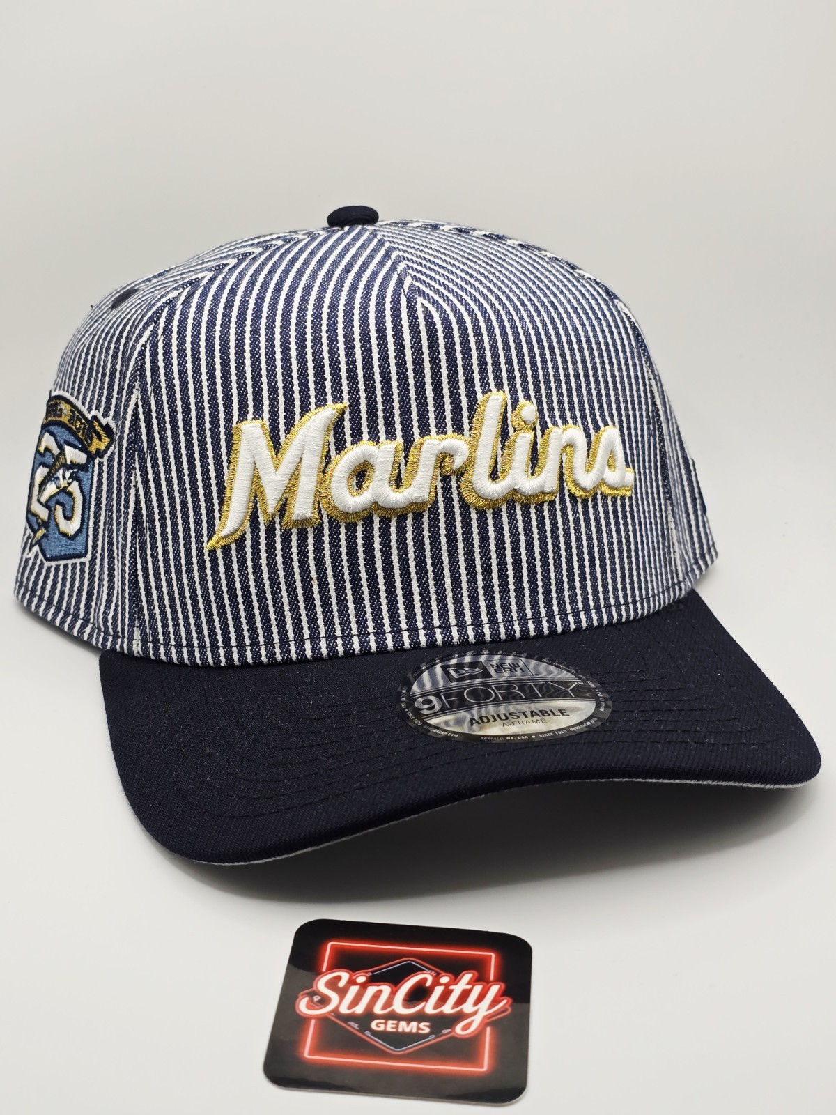 New Era Florida Miami Marlins Striped Denim 9FORTY A-Frame Snapback Hat New Era Florida Miami Marlins Striped Denim 9FORTY A-Frame Snapback Hat