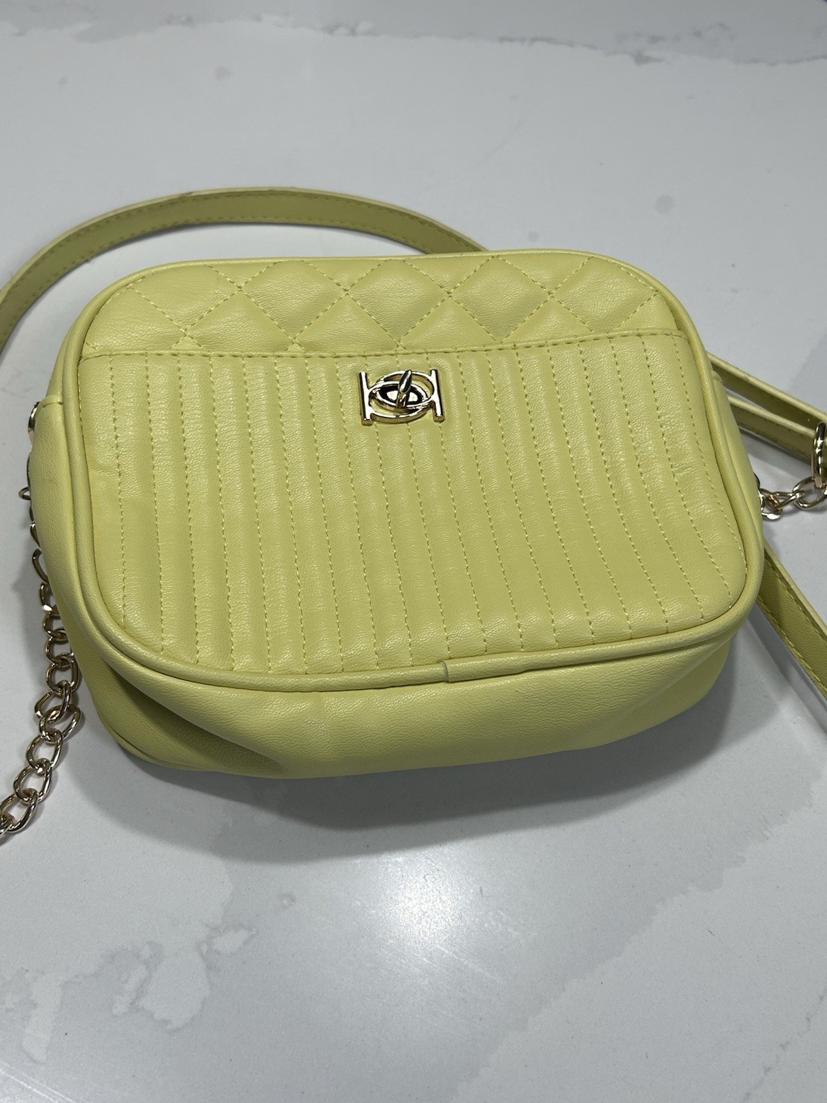 bebe Hazel Multi-Quilt Crossbody Purse in a pastel Butter/Yellow  Chain Strap 