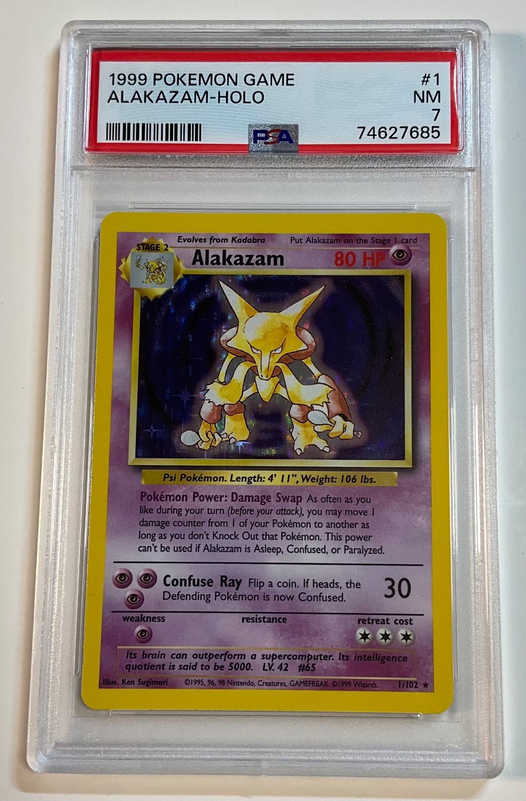1999 Pokemon Base Set ALAKAZAM Holo #1 PSA 7 NM
